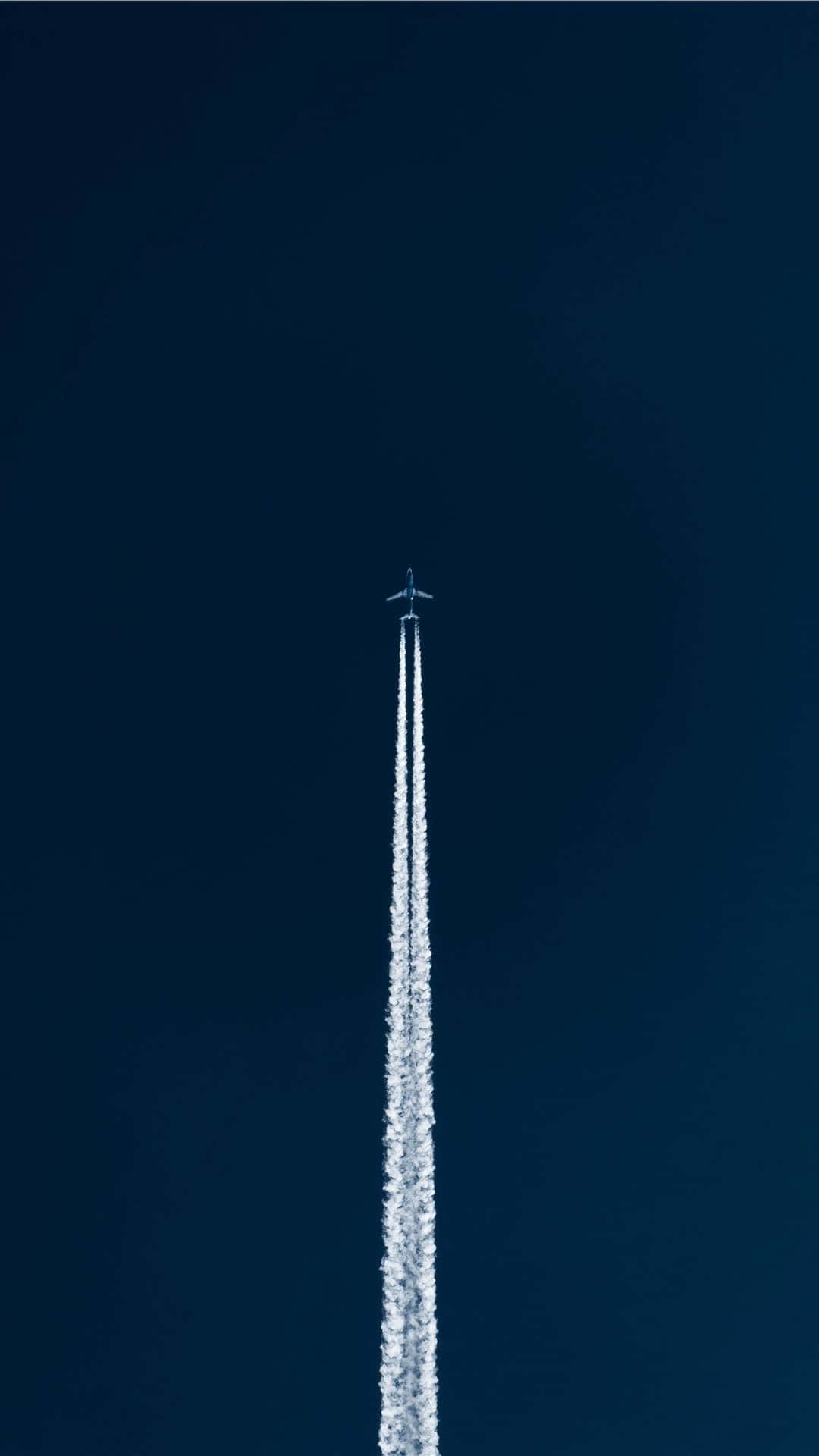 Jet Contrail Against Blue Sky Wallpaper