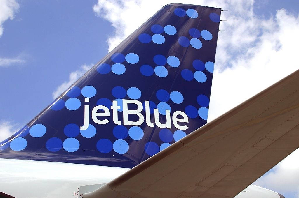 JetBlue Airplane Blå Polka Dot Rudder Wallpaper Wallpaper