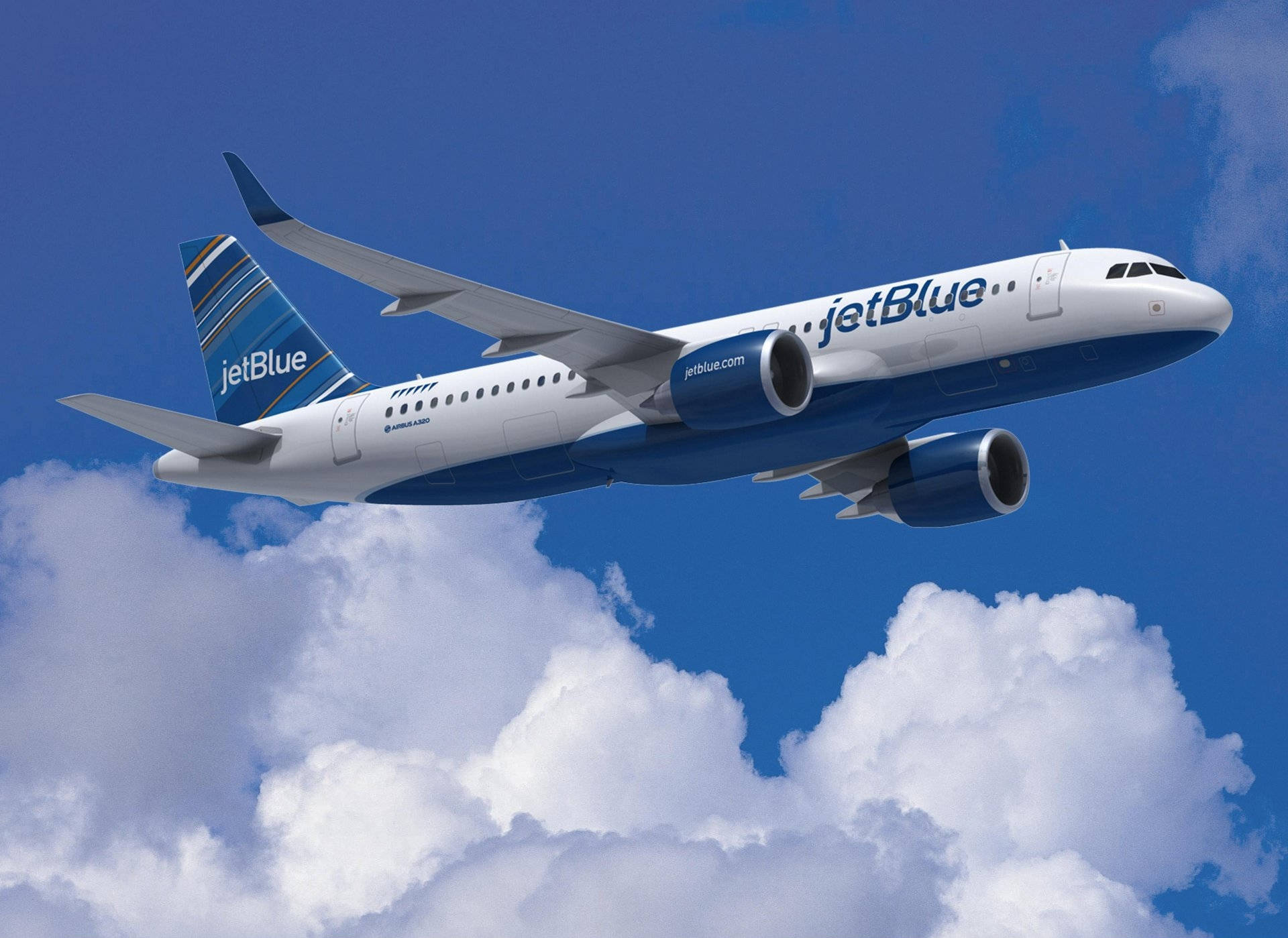 Jetblue Airways Airplane Flying By Clouds Background