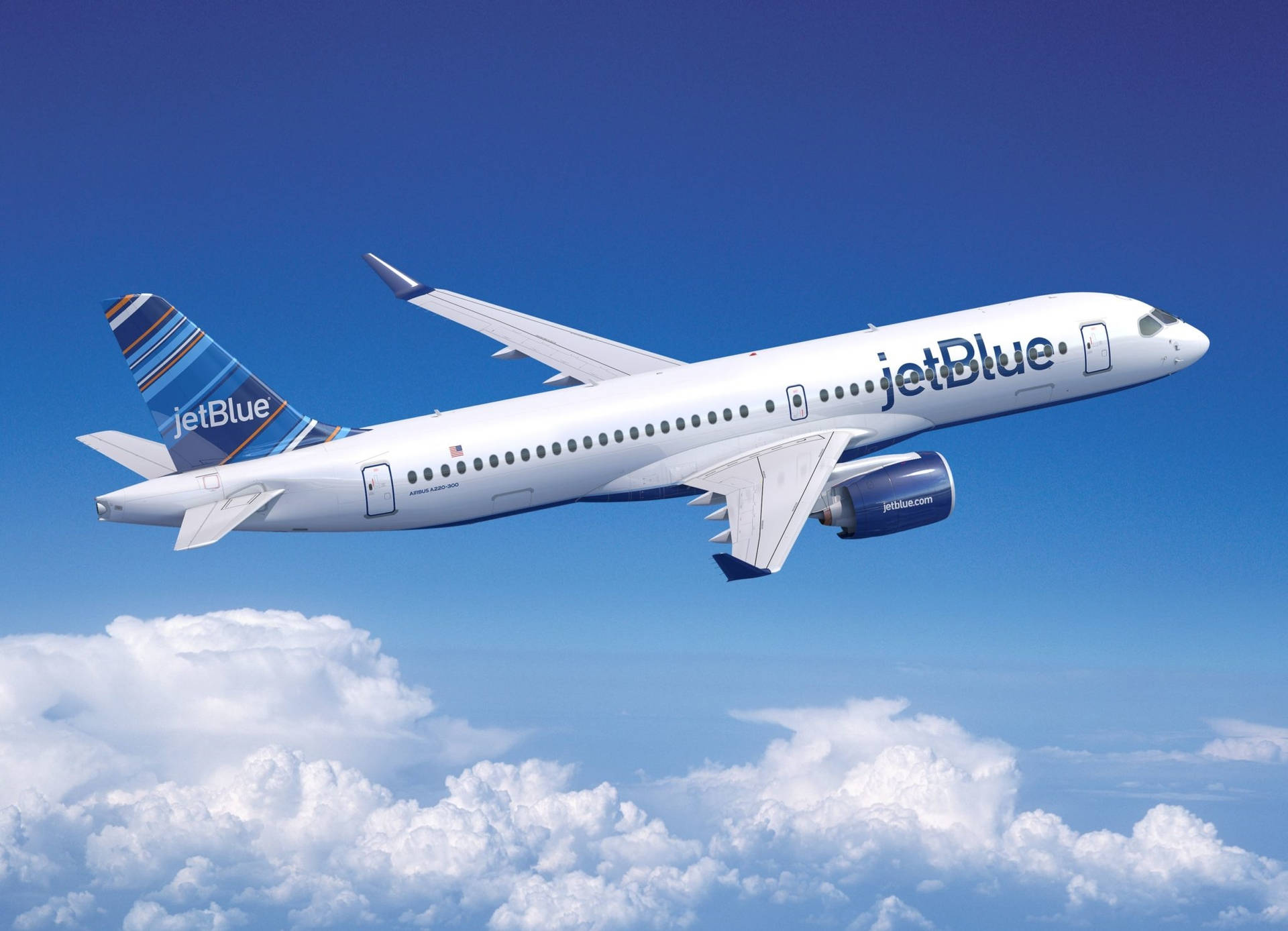 JetBlue Flight On Blue Cloudy Skies Wallpaper