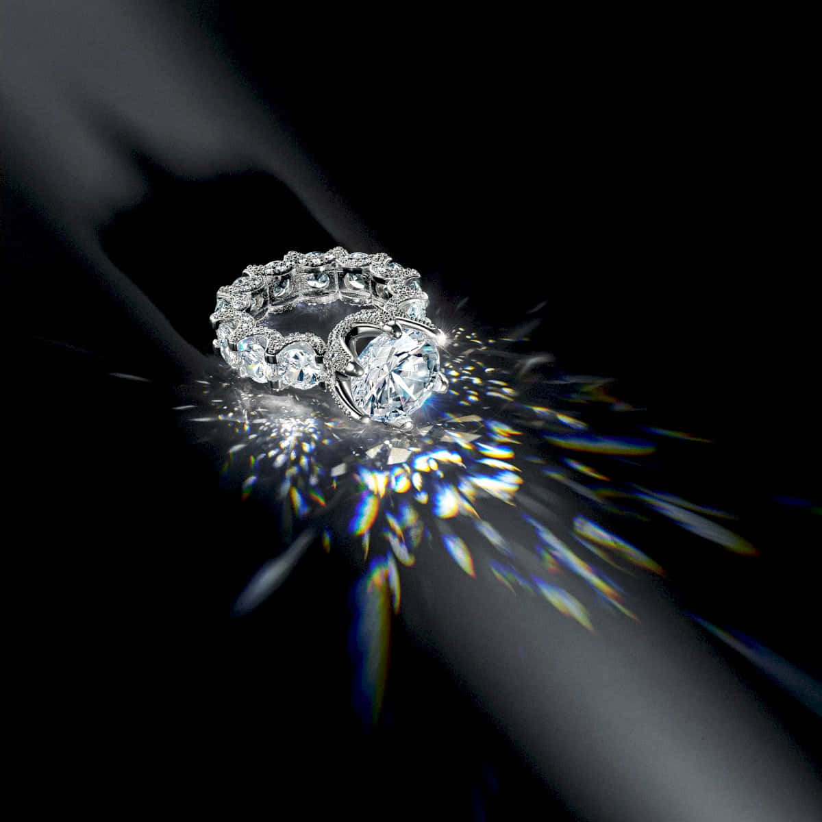 A Diamond Ring With A Light Shining Through It