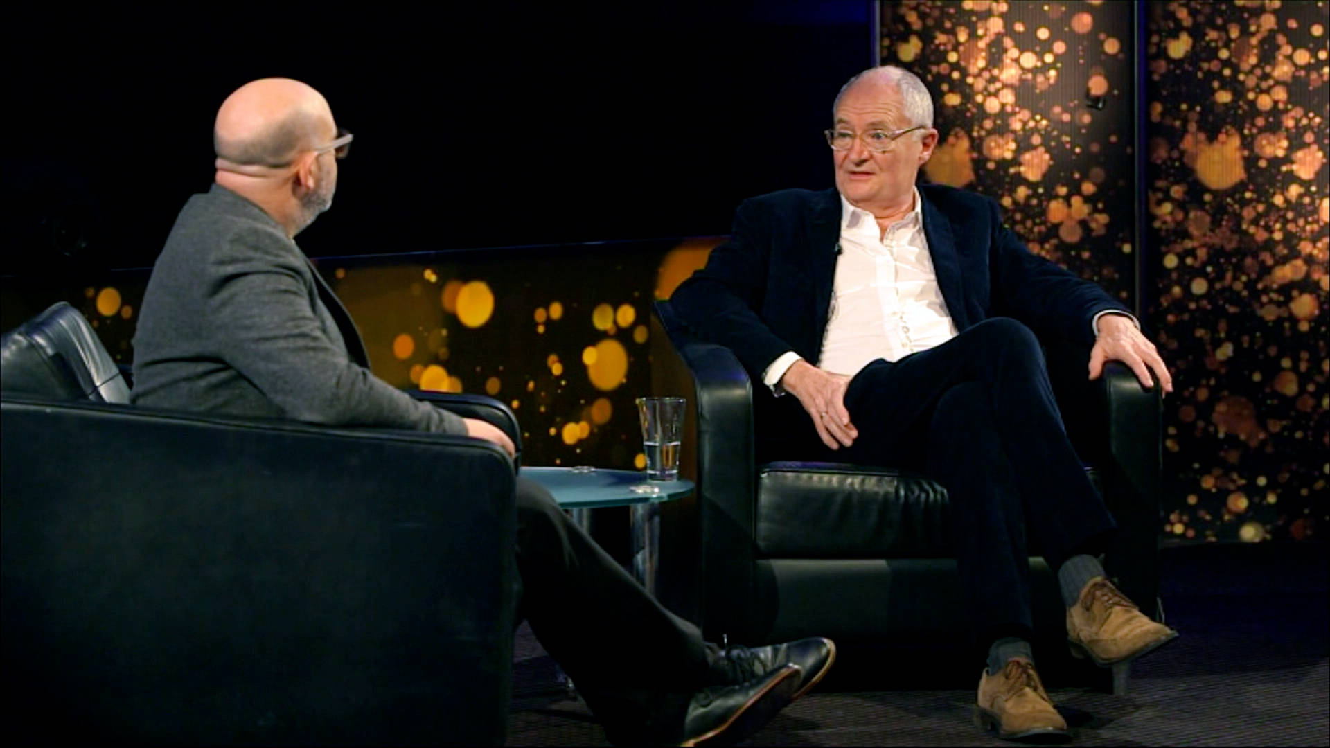 Renowned Actor Jim Broadbent During Television Interview Wallpaper