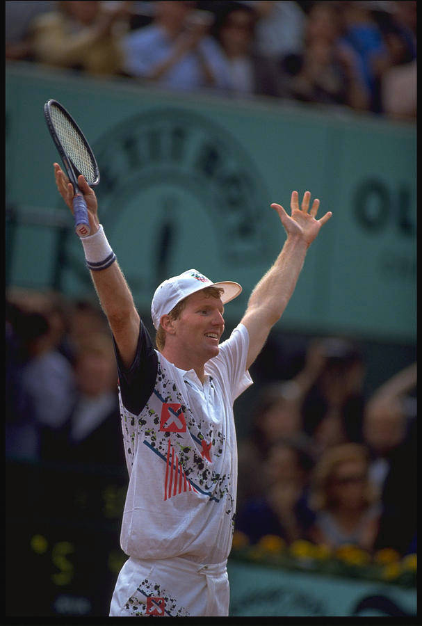 Caption: Jim Courier Celebrating a Tennis Victory Wallpaper