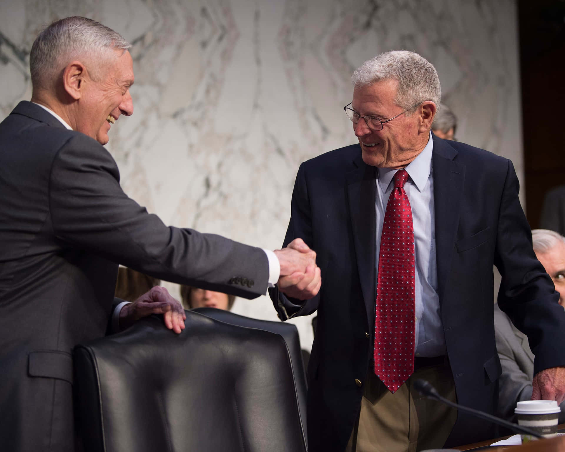 Senator Jim Inhofe Engaging in a Handshake Wallpaper