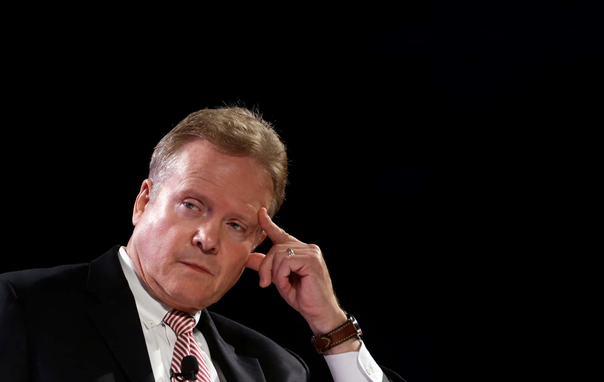 Thoughtful Jim Webb With Finger on Forehead Wallpaper