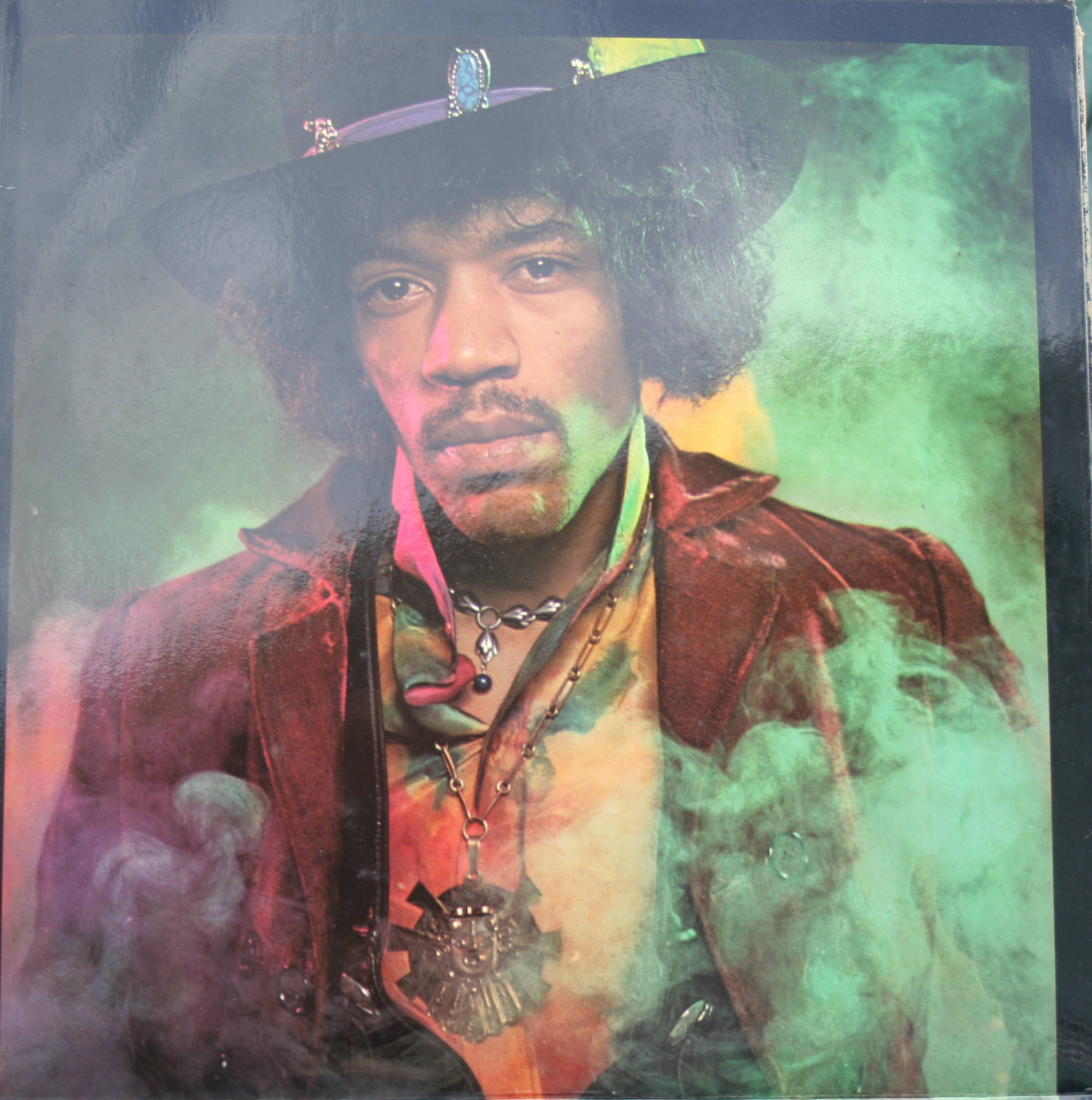 Jimi Hendrix omsluttet af røg. Wallpaper