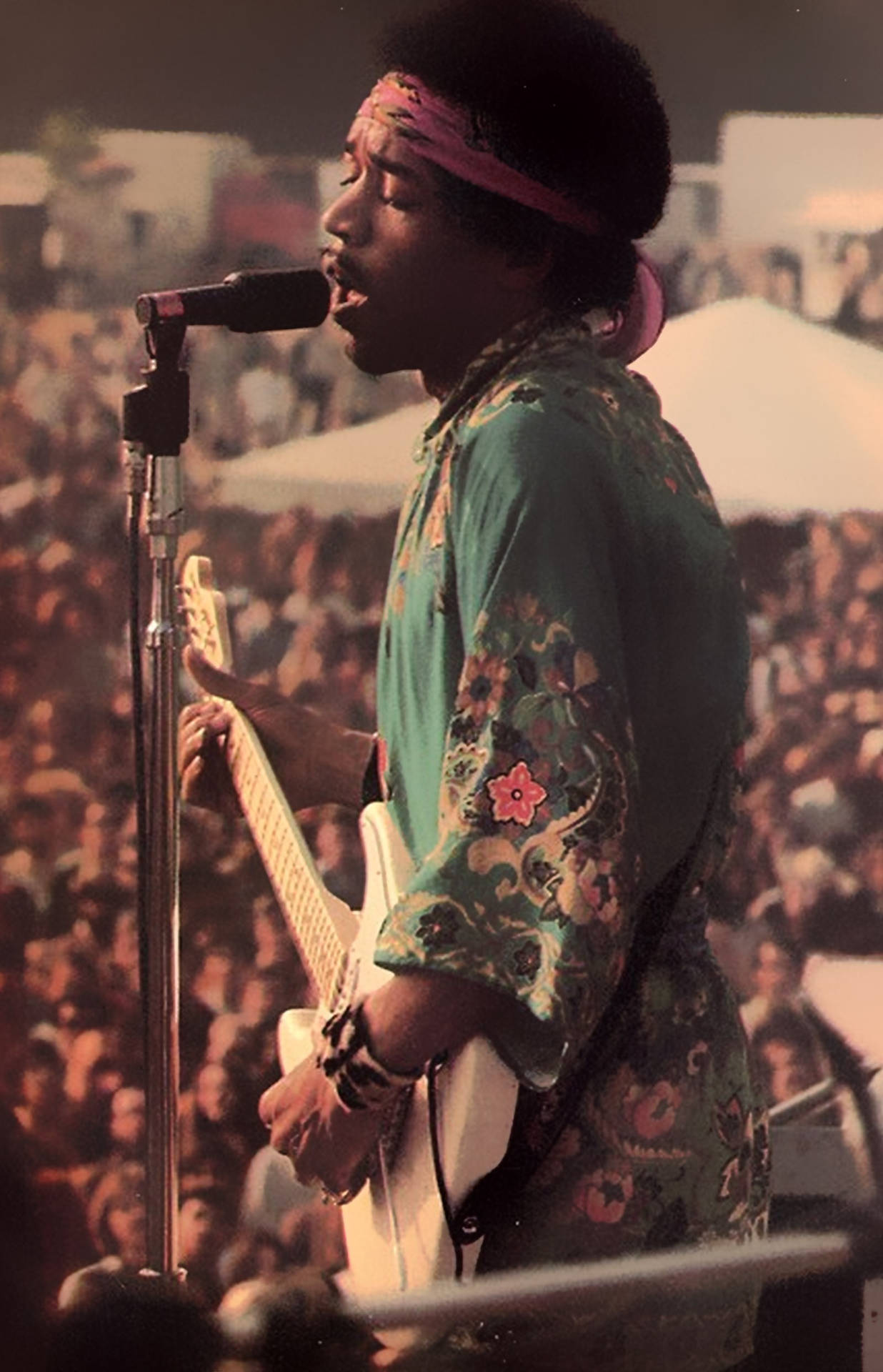Jimi Hendrix Playing In Front Large Crowd Wallpaper