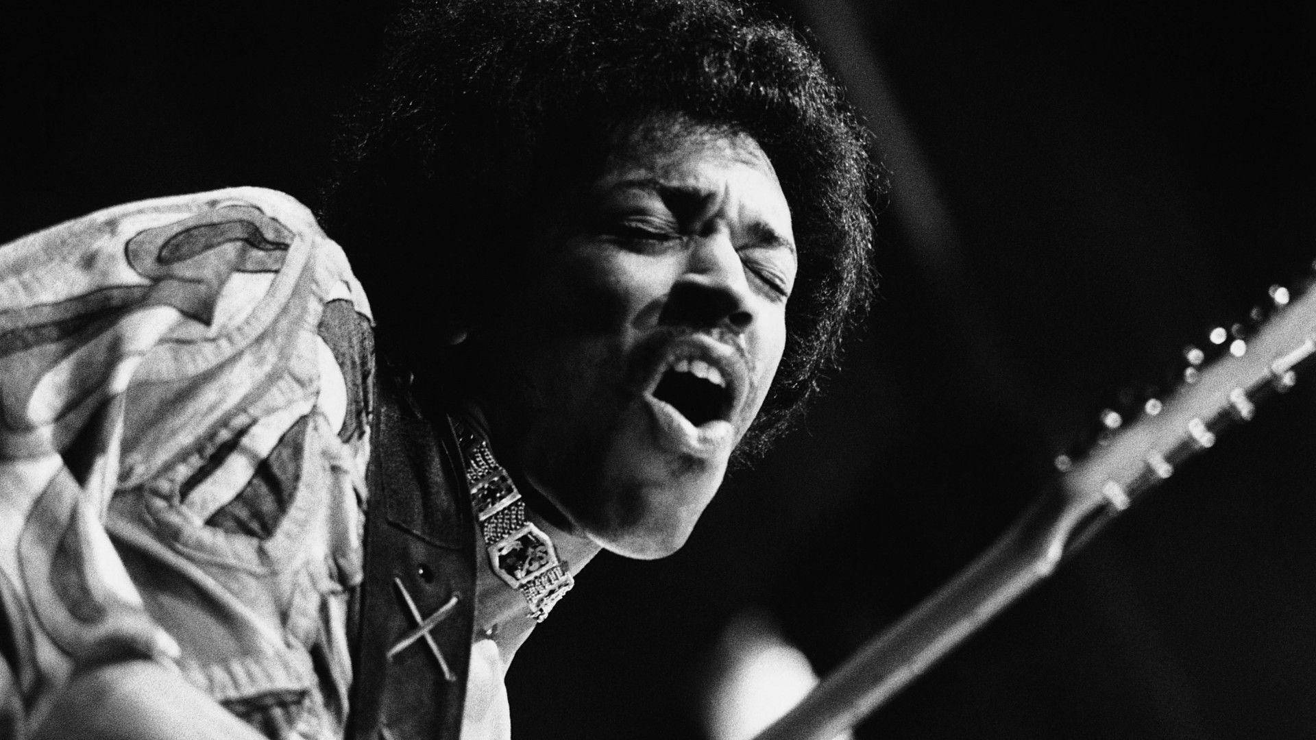 Jimi Hendrix Singing With Passion Wallpaper