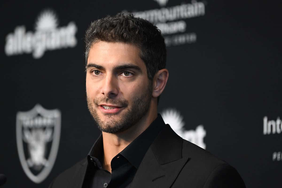 Jimmy Garoppolo In Actie Op Het Voetbalveld Achtergrond