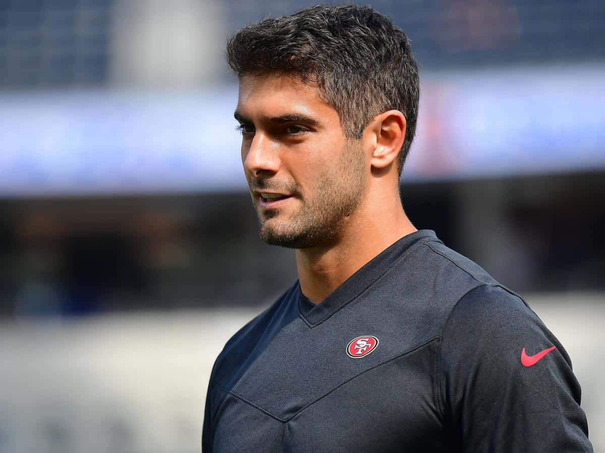 Jimmy Garoppolo In Actie Op Het Veld Achtergrond