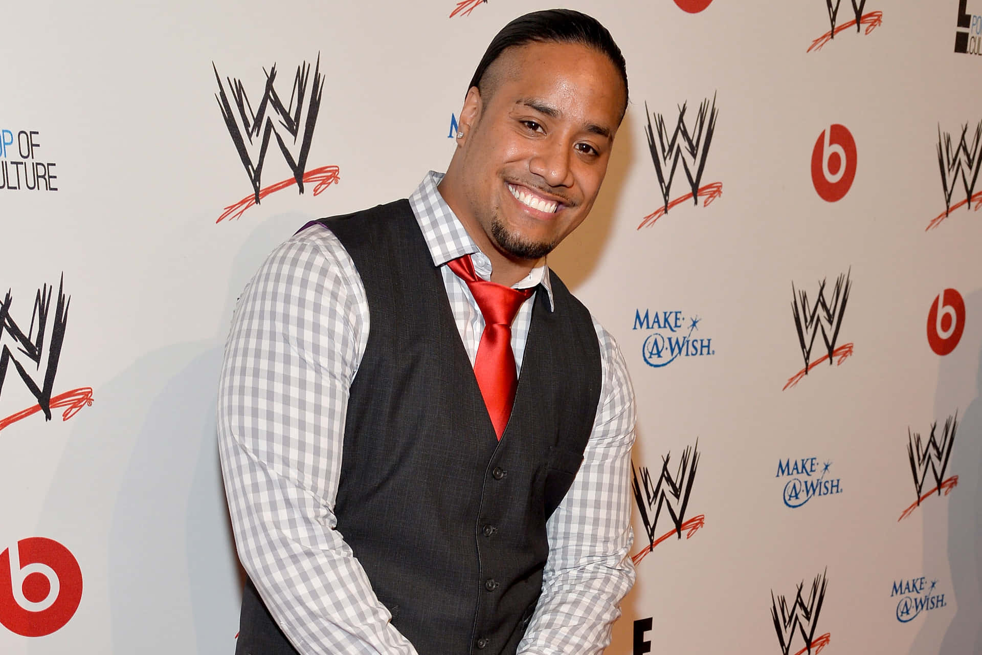 Caption: Jimmy Uso in Action at WWE Event Wallpaper