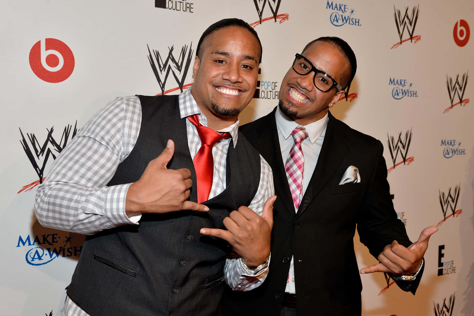 Caption: WWE Superstar Jimmy Uso at the Super Stars for Hope event Wallpaper