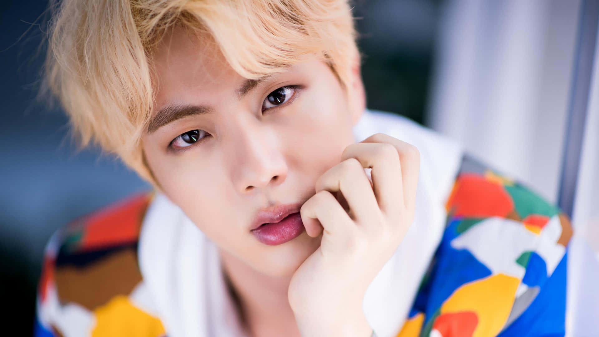 Jin, a singer, songwriter, actor, and poet from South Korea