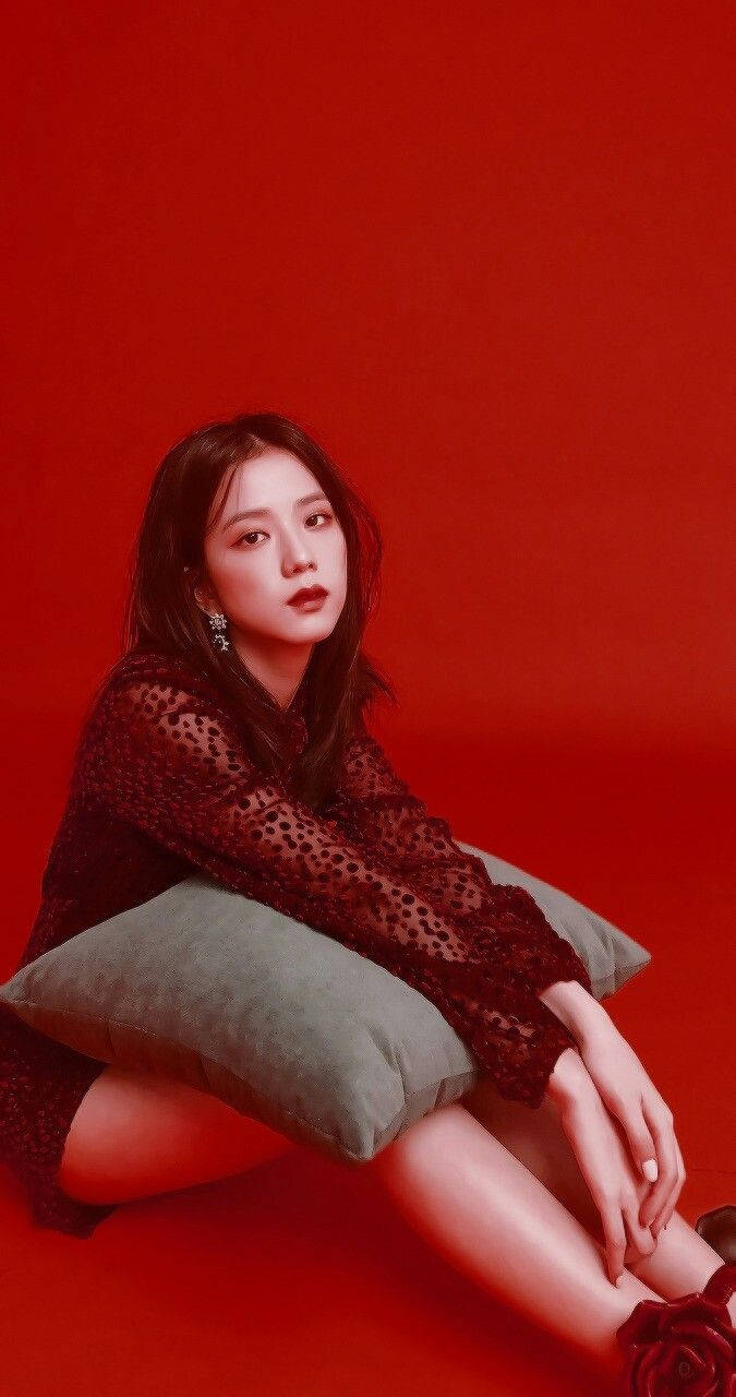 Jisoo Cute Photoshoot Red Background Wallpaper