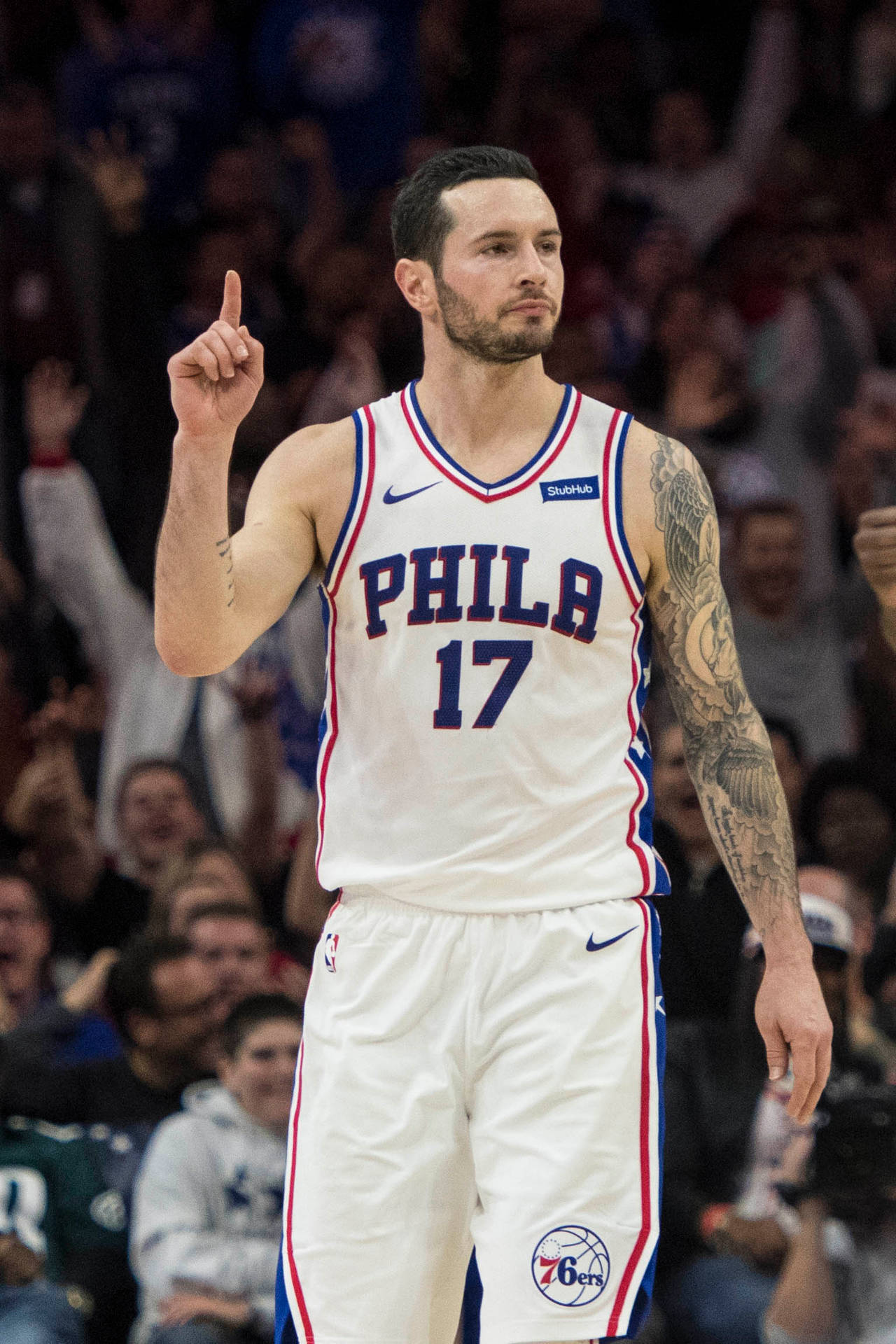 Jj Redick While Pointing Above Wallpaper