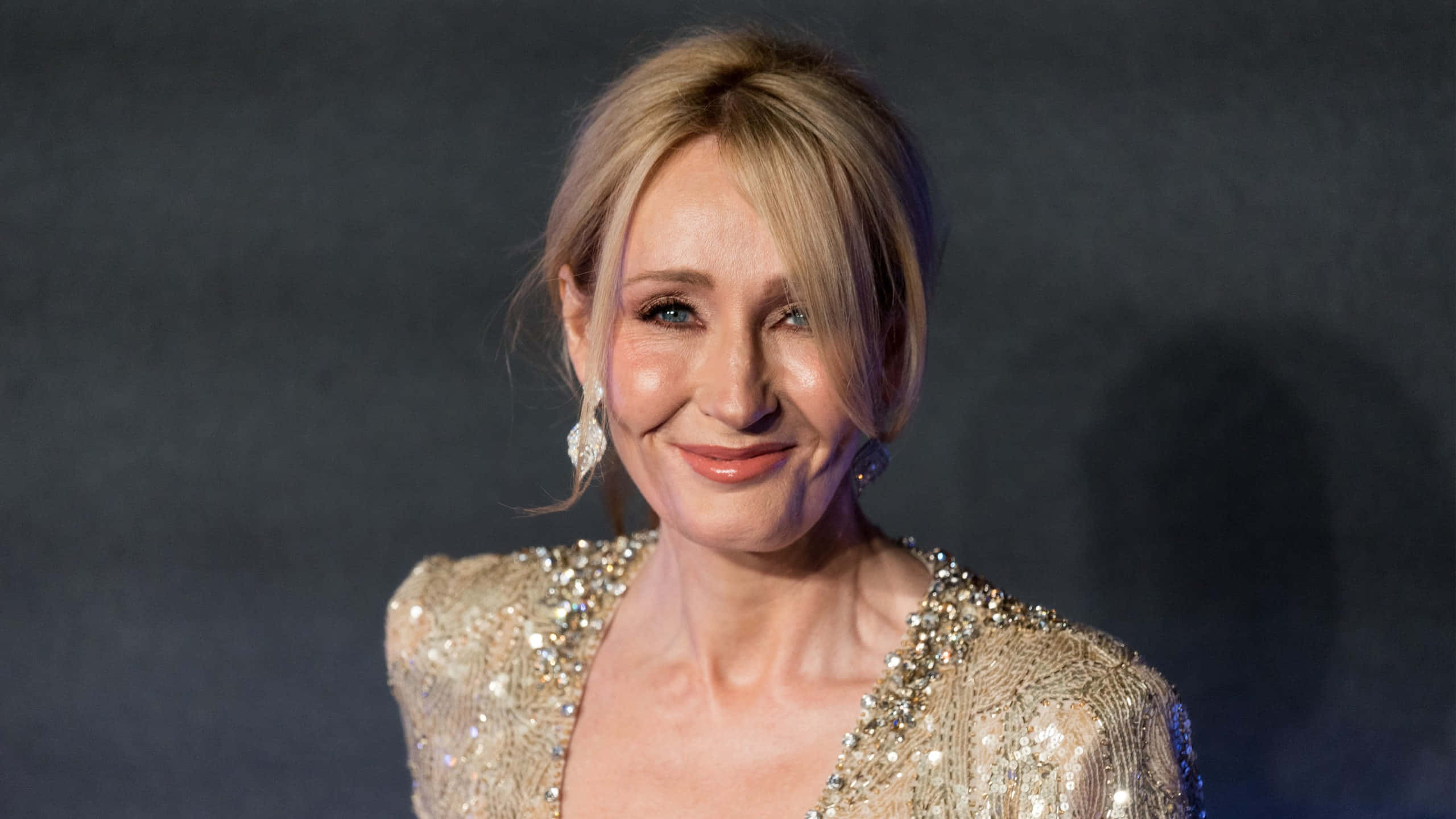 Jk. Rowling Sonriendo En Un Evento De Libros Fondo de pantalla
