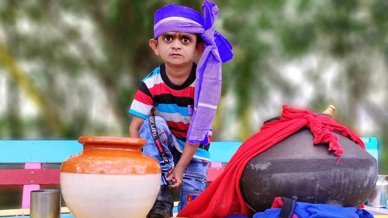 Jkk Entertainment's Chotu With A Scarf On His Head Wallpaper