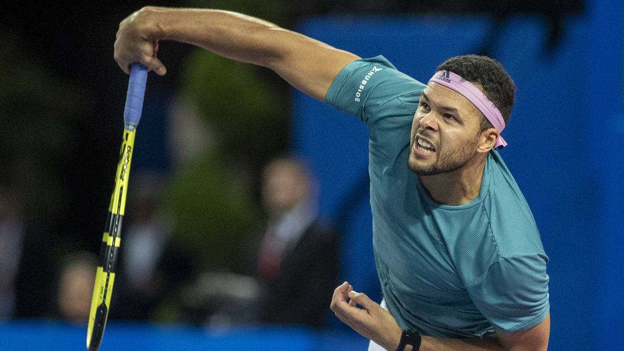 Jo-wilfried Tsonga After Serving The Ball Wallpaper