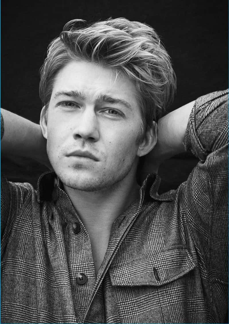 Joe Alwyn, portraying a sombre expression Wallpaper