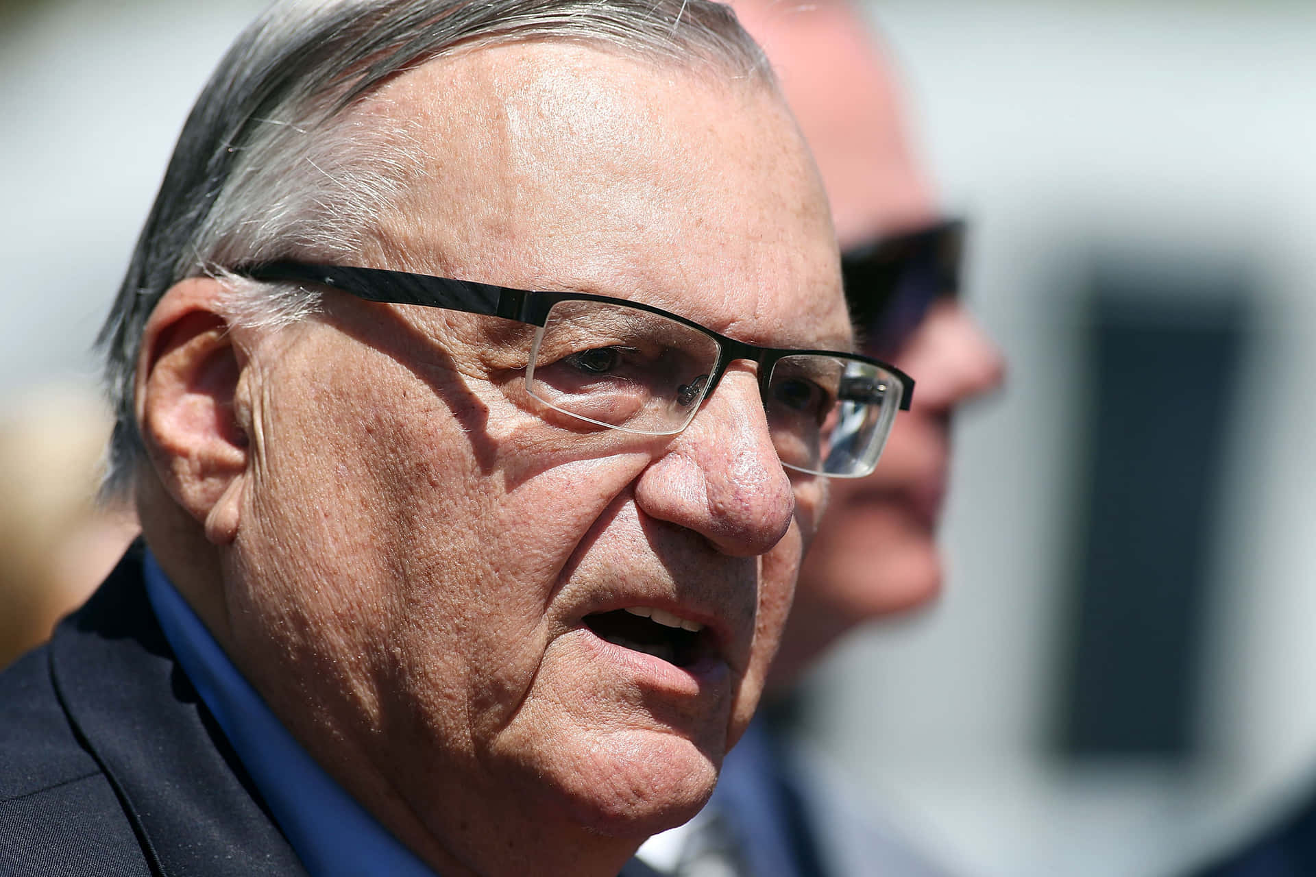 Joe Arpaio During A Press Conference Wallpaper