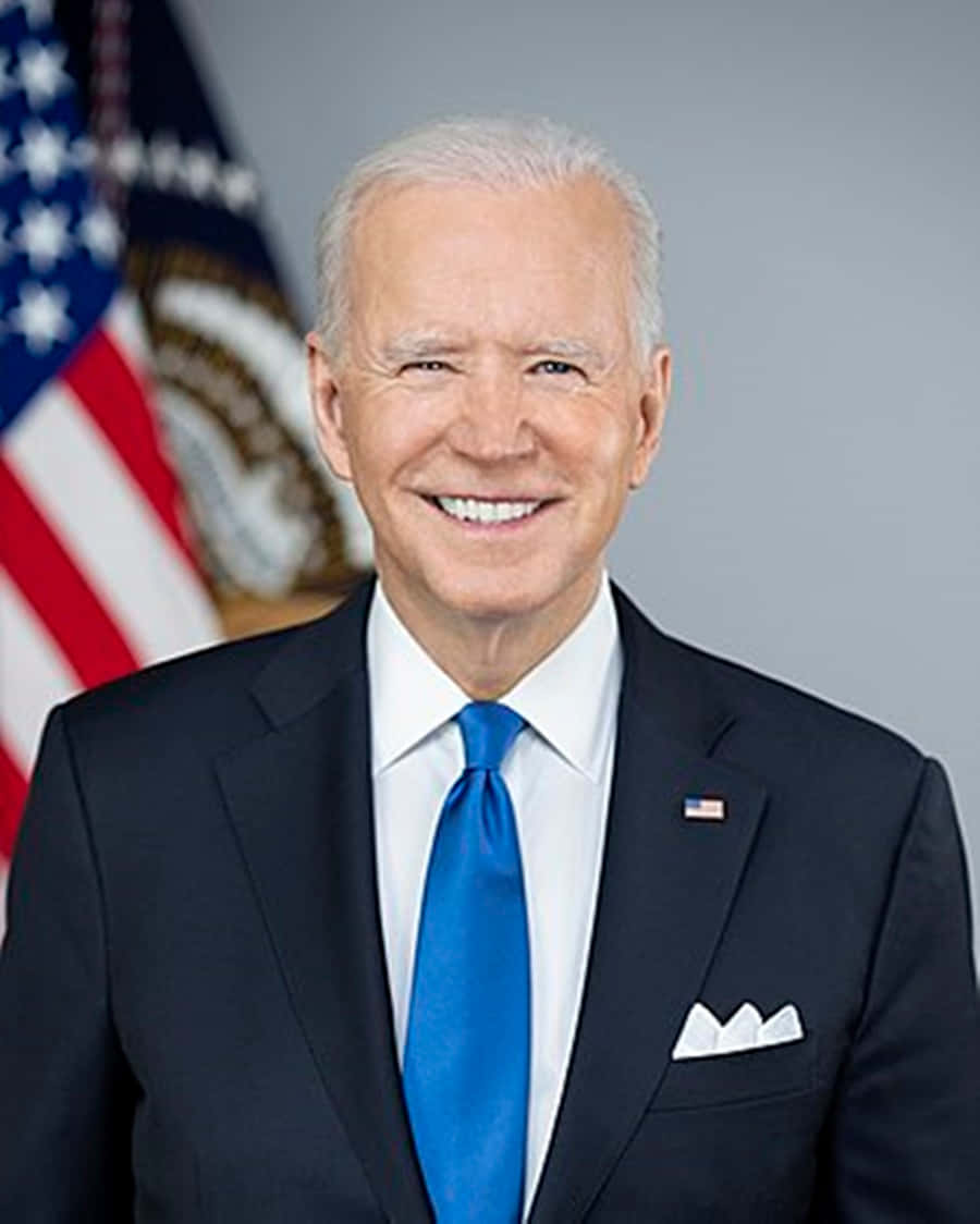 Joe Biden smiles at a campaign rally