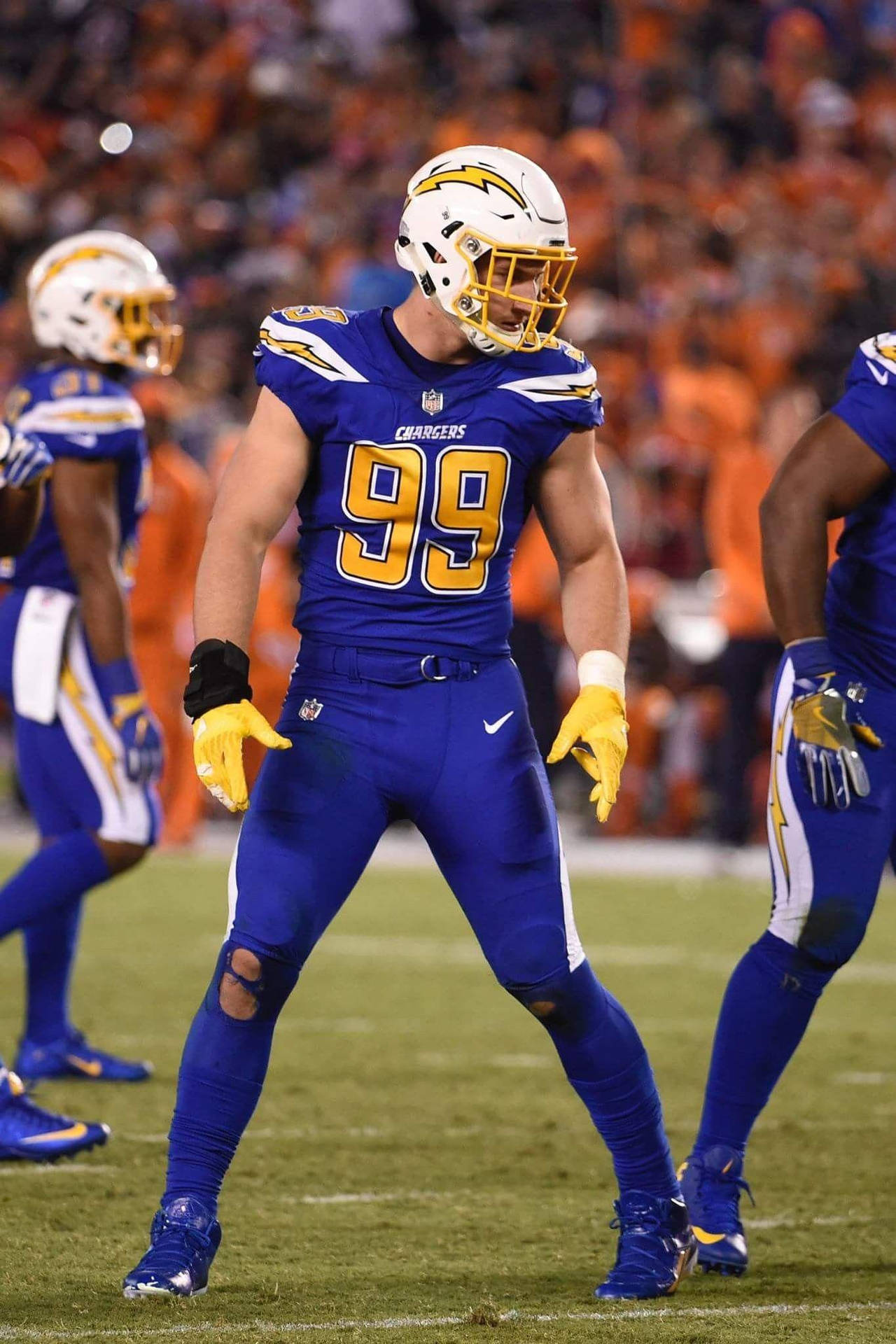 Joey Bosa in Mid-Game Action Wallpaper