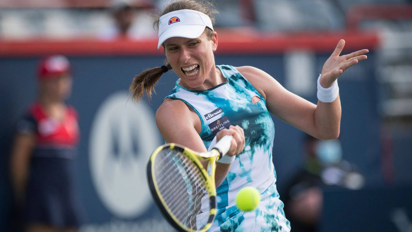 Johanna Konta in Powerful Action During a Match Wallpaper