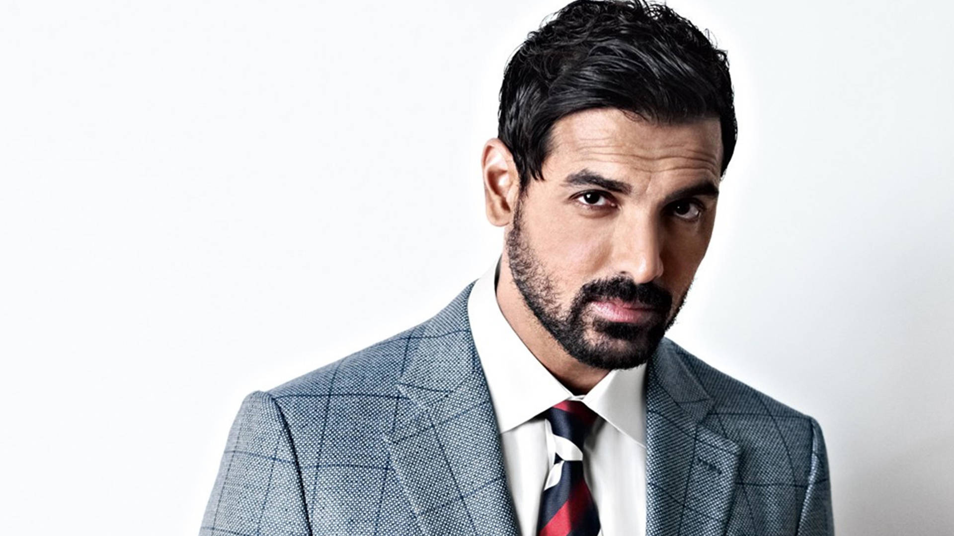 John Abraham In Suit Background