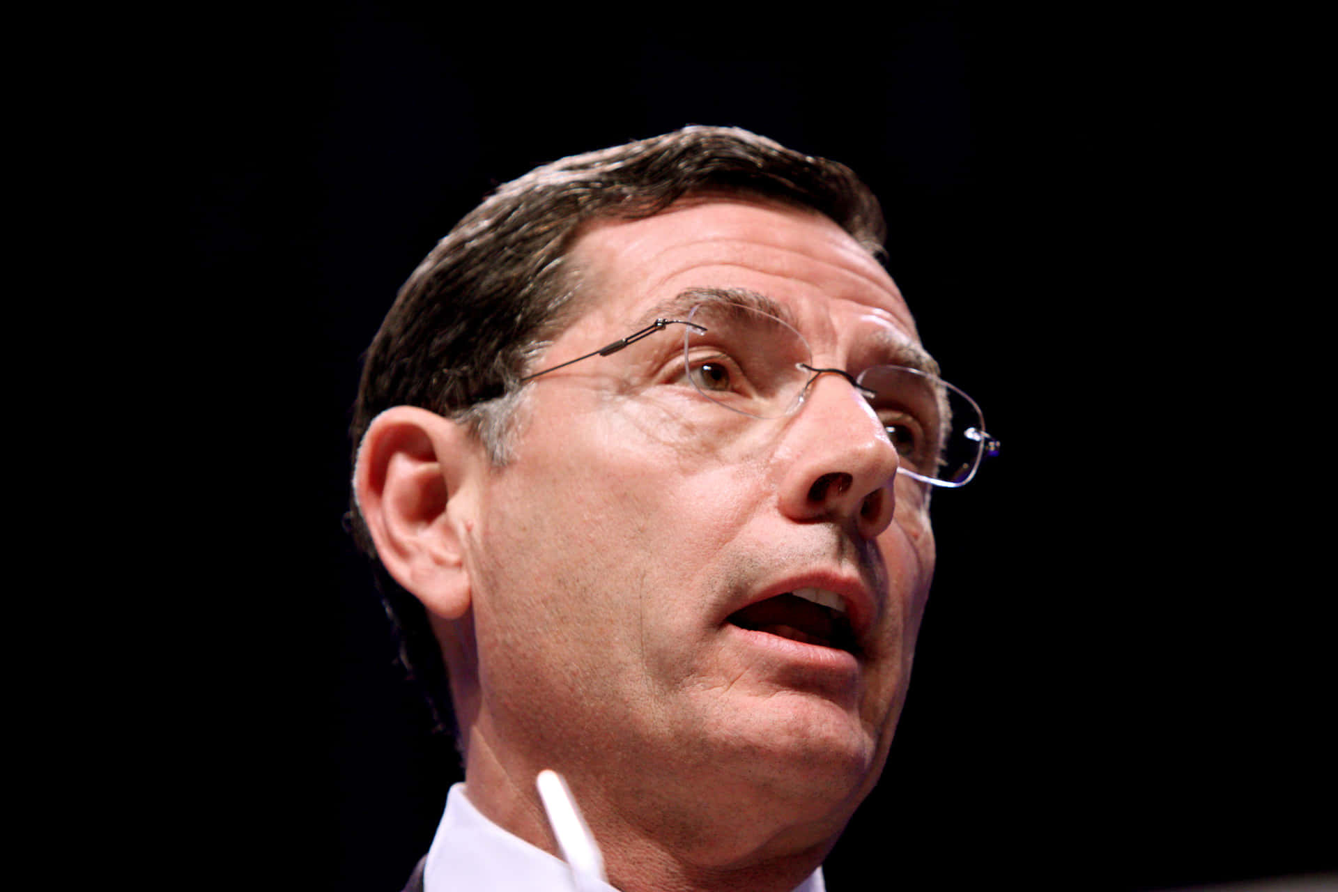 John Barrasso Face With Black Background Wallpaper