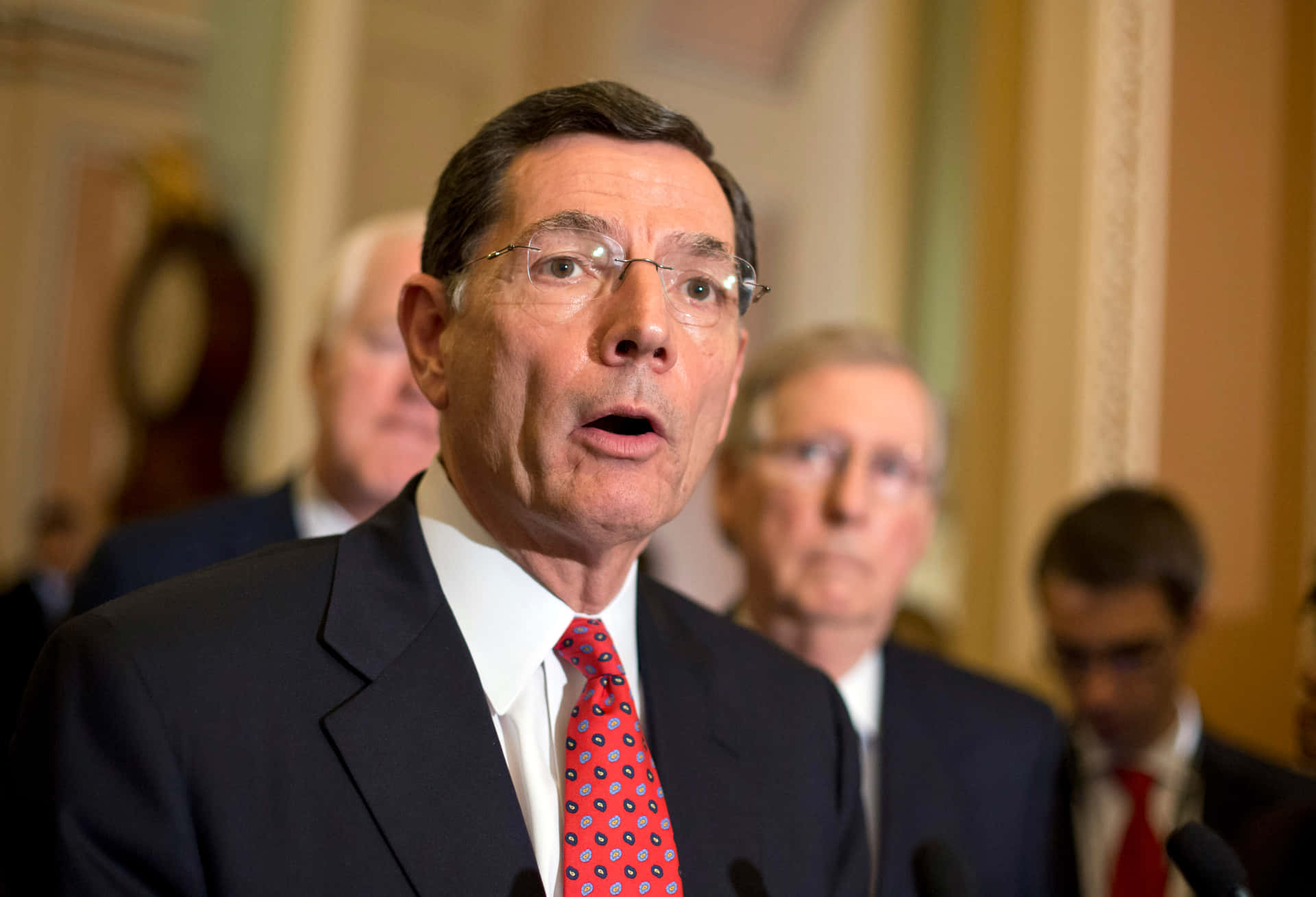 John Barrasso With People In Background Wallpaper