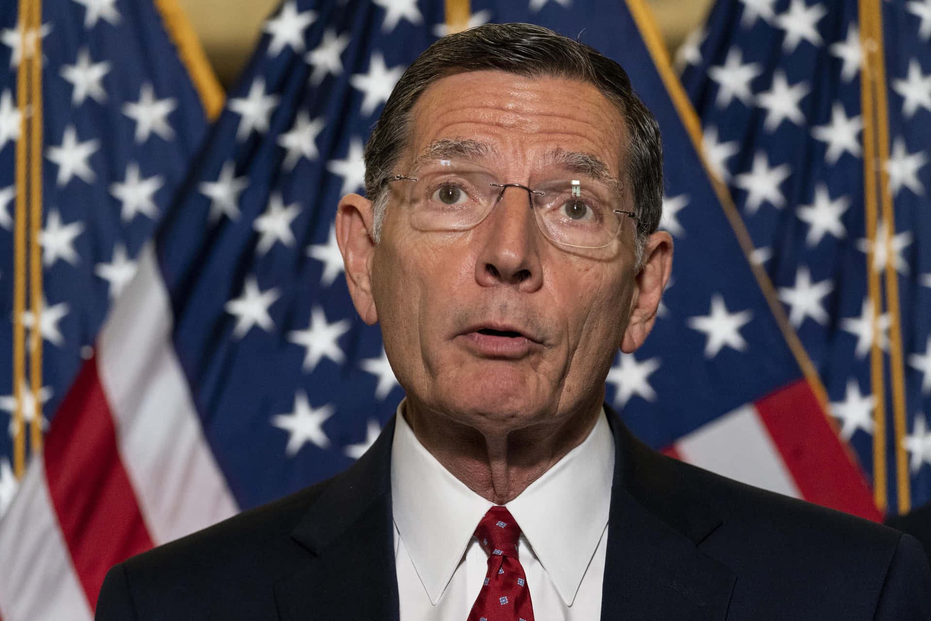 John Barrasso With US Flags Wallpaper