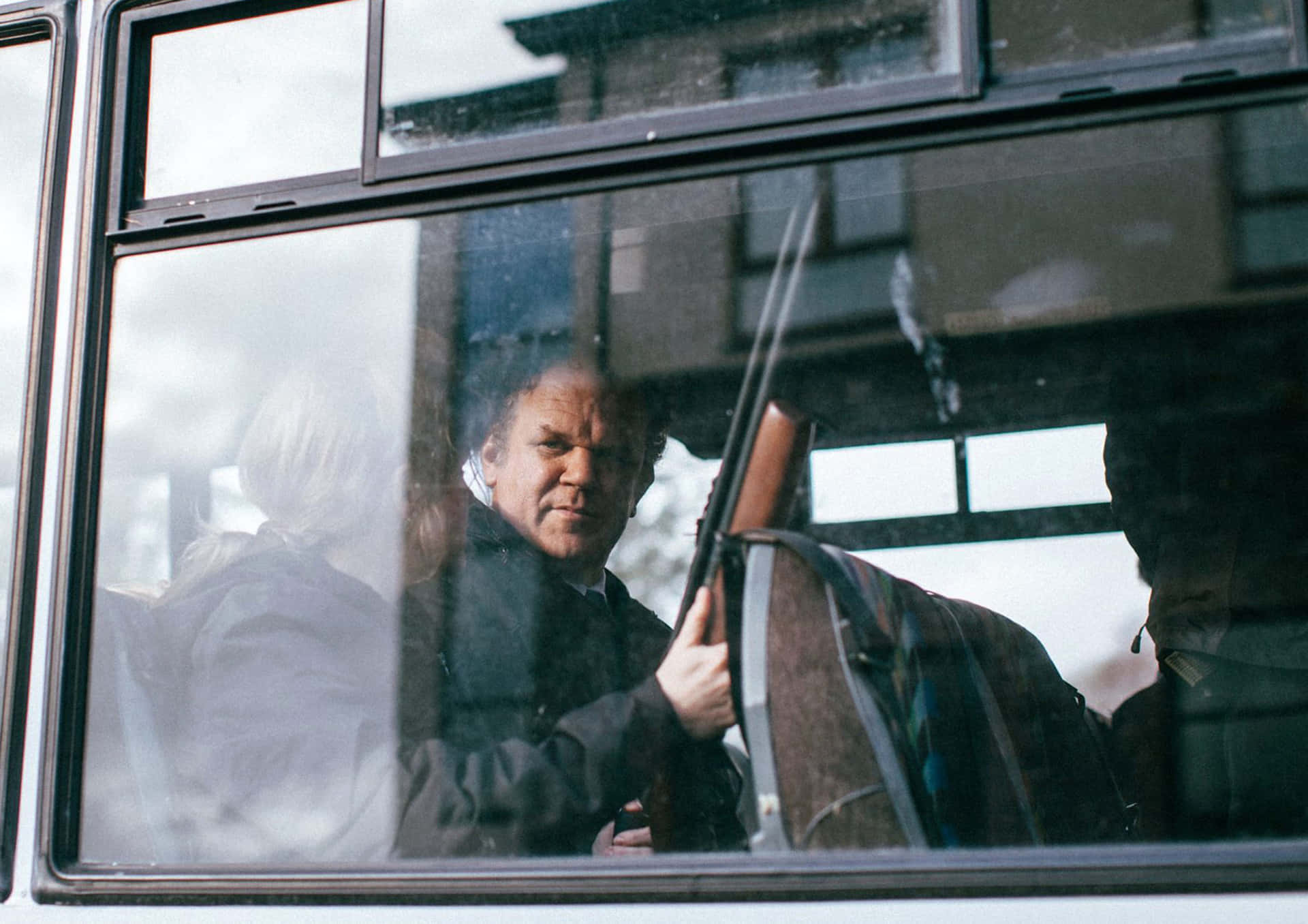 John C. Reilly striking a pose on a photoshoot Wallpaper