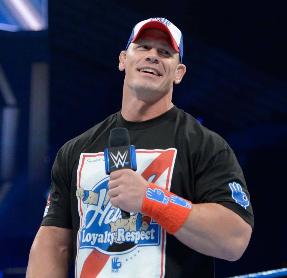 Caption: John Cena striking a pose in the ring