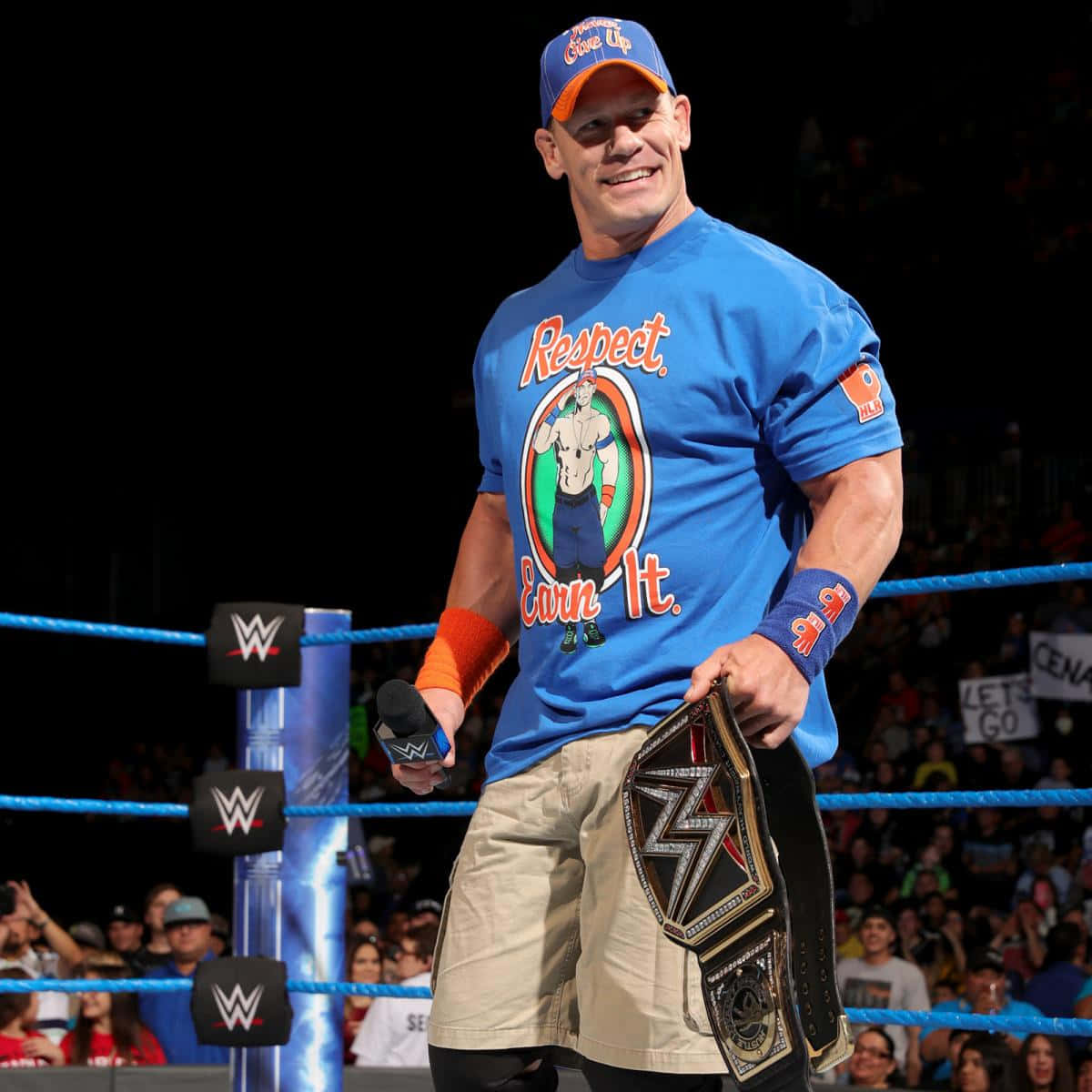 John Cena showcasing his trademark pose in the ring