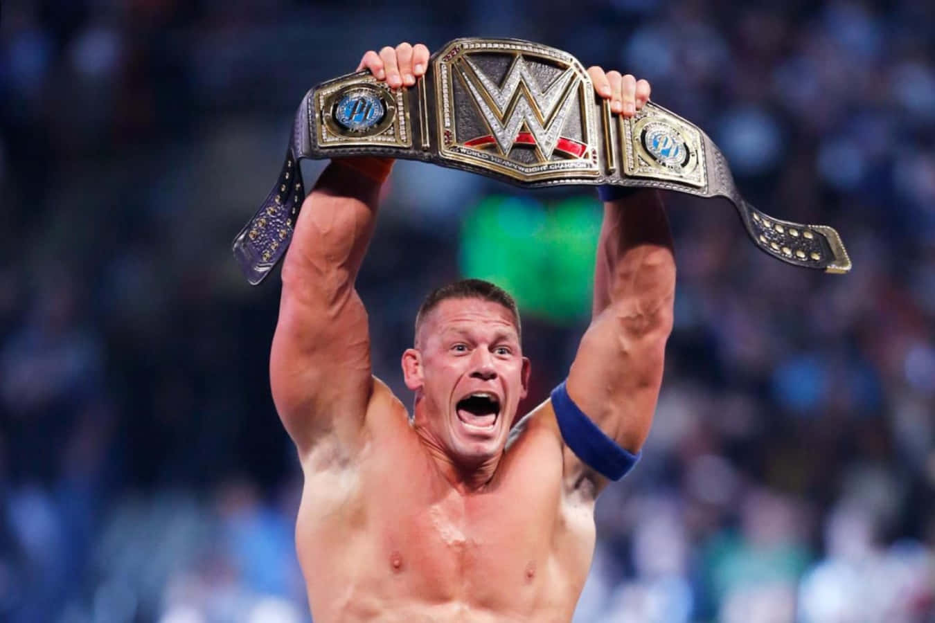 John Cena flexing his muscles in a victorious pose