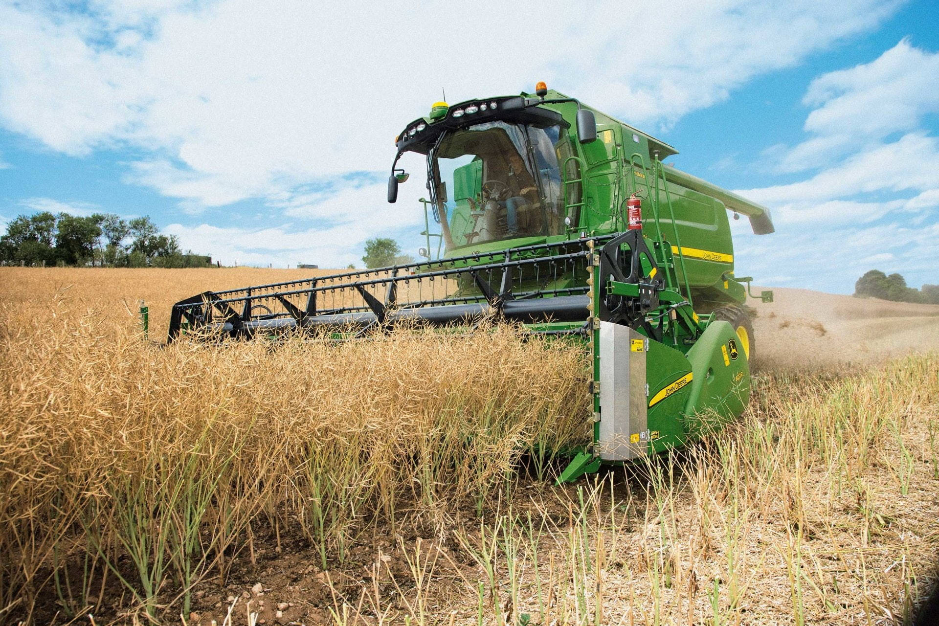 John Deere Machine Harvesting Wheat Field Wallpaper