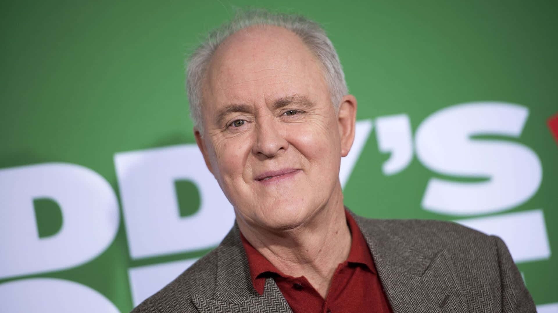 The prolific actor John Lithgow in a thoughtful pose Wallpaper