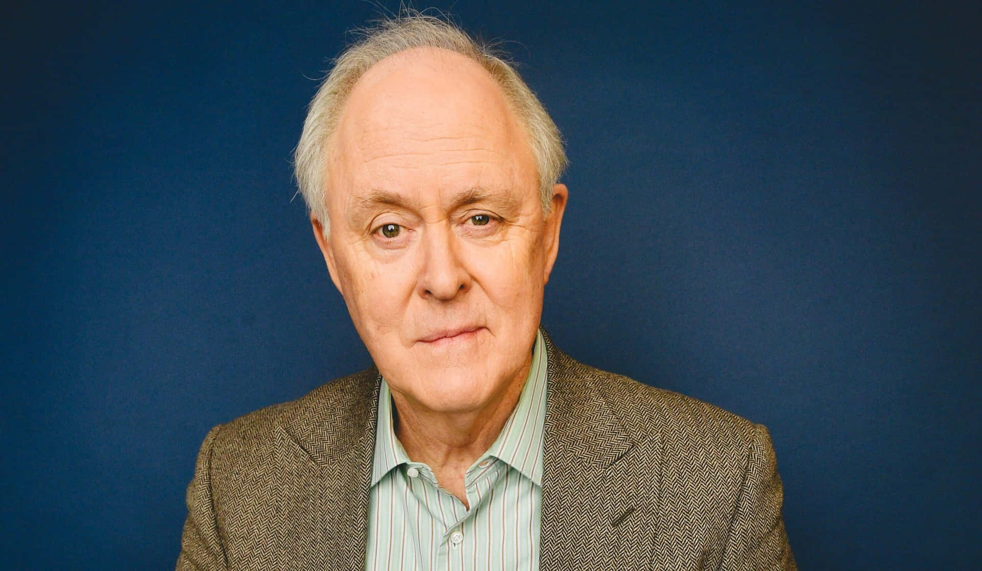 Distinguished Actor John Lithgow in a Portrait Shot Wallpaper