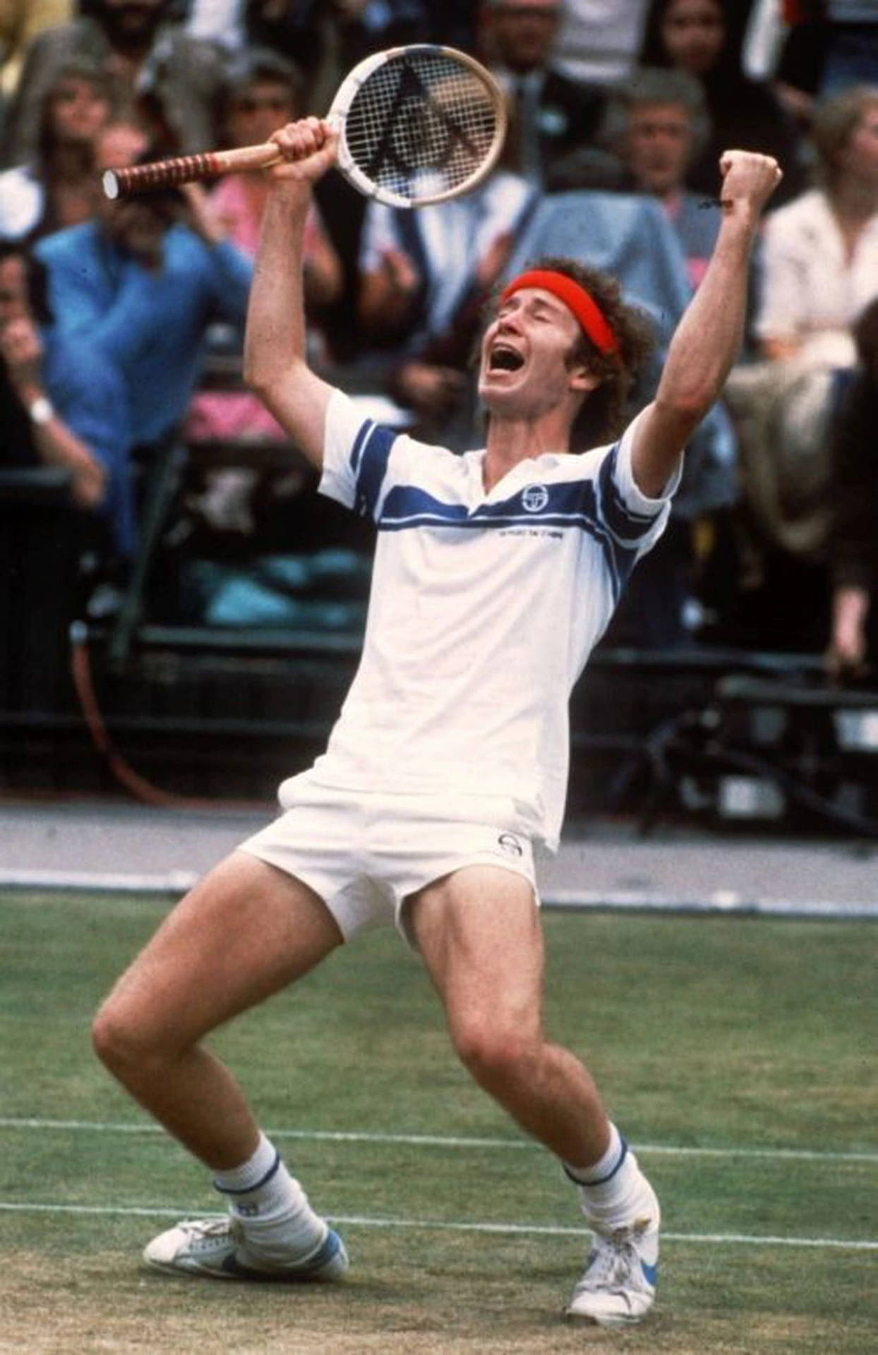 John McEnroe jublende over sejren. Wallpaper