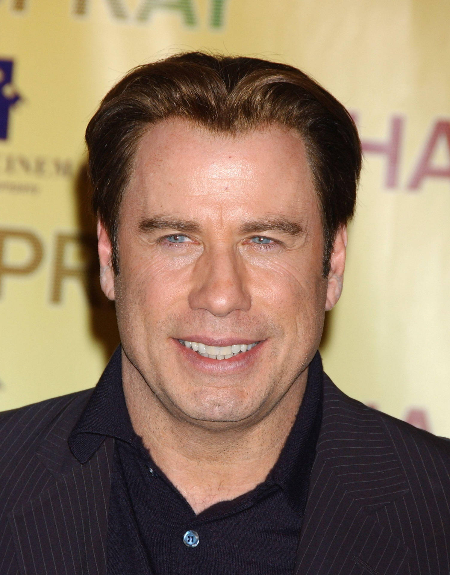 John Travolta Attending Awards Show Wallpaper