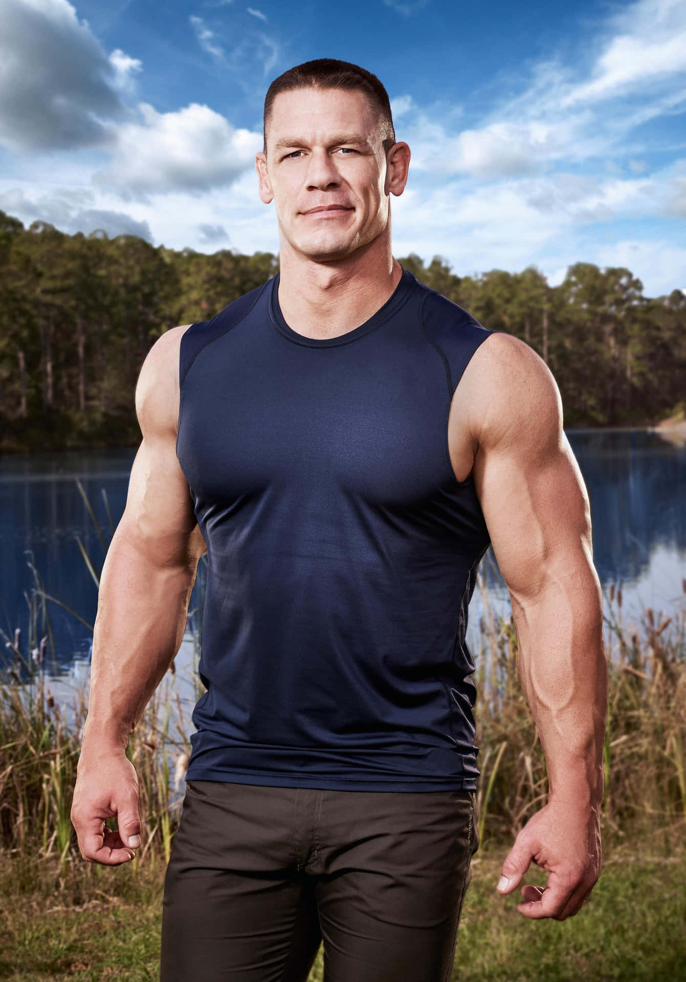 Johncena Flexionando Sus Bíceps Con Una Sonrisa Triunfante