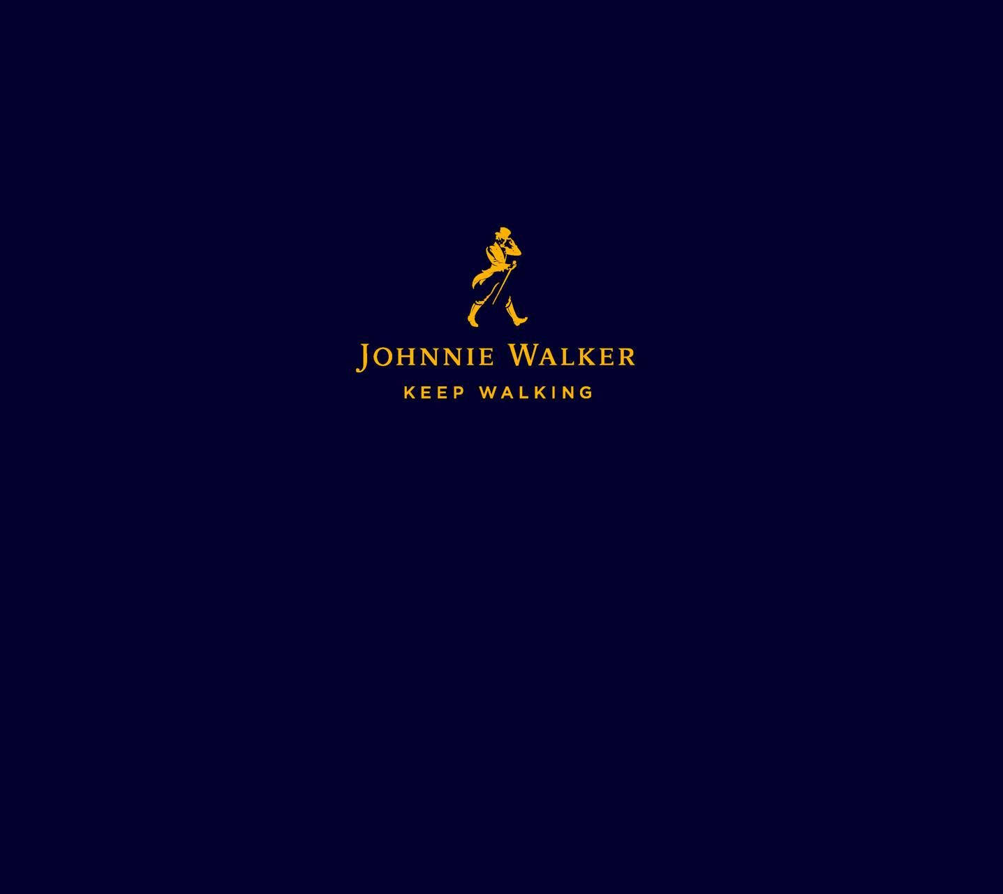 Johnnie Walker Gold Logo Tapet: Drej dig til den gyldne klasse Wallpaper