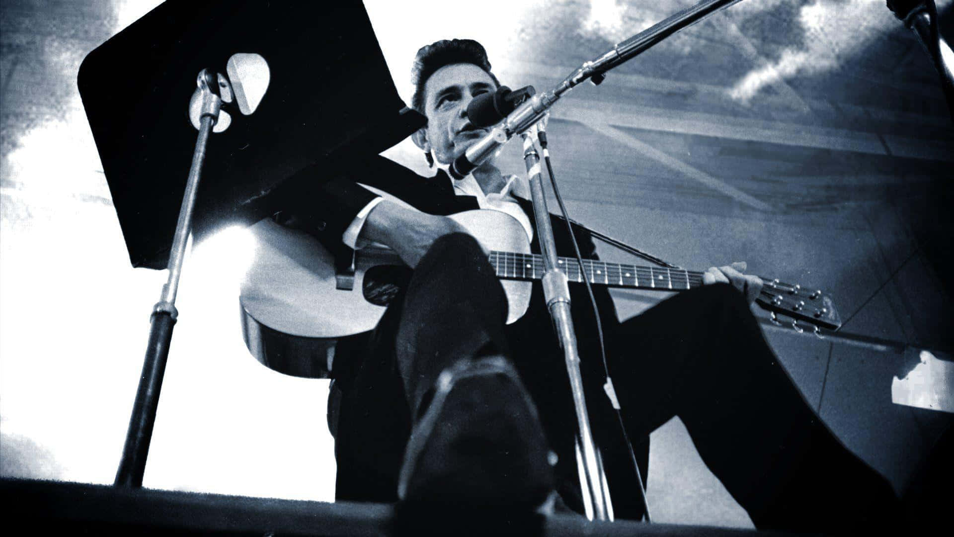 Johnny Cash Performs on Stage