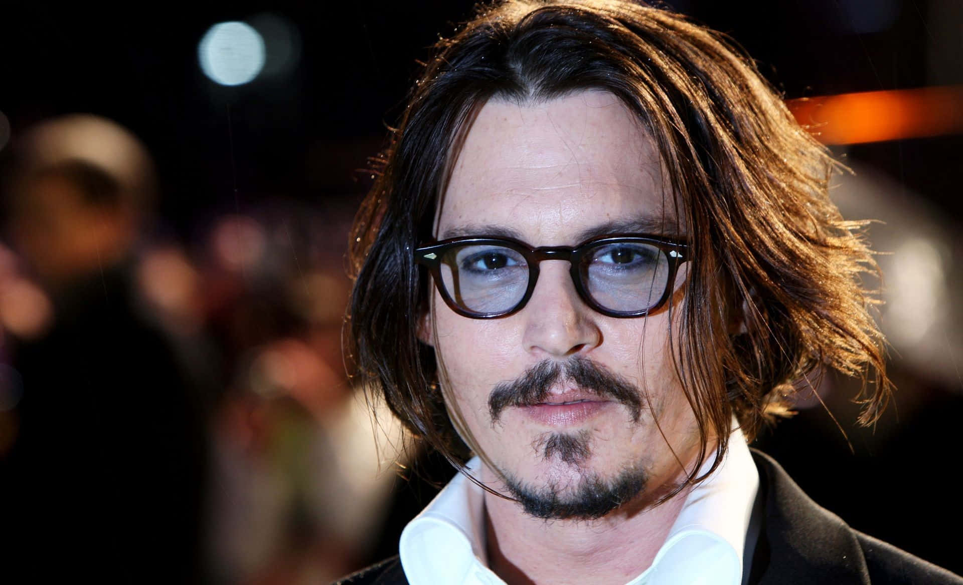 Download Johnny Depp Looking Contemplative | Wallpapers.com
