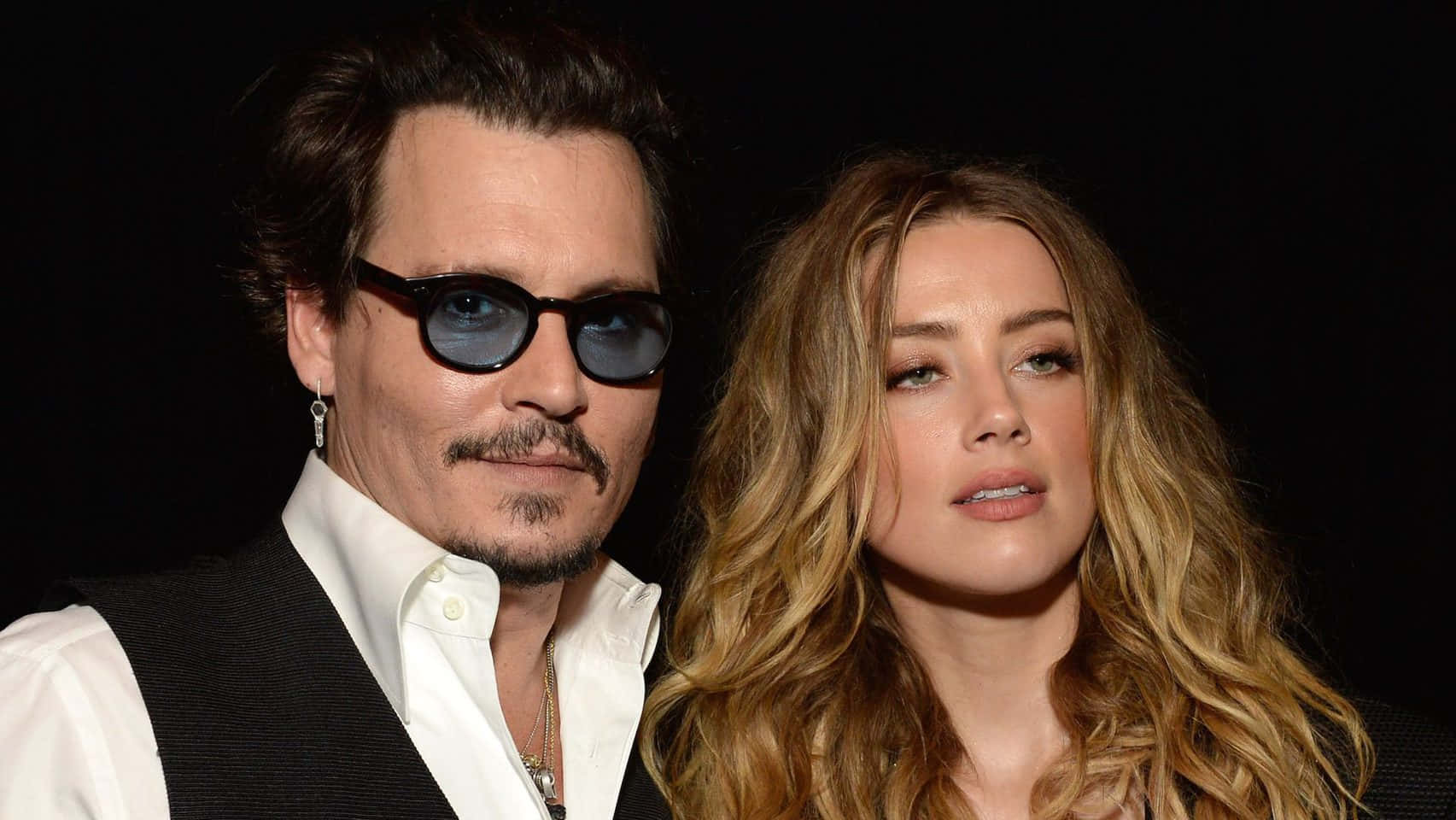"Johnny Depp and Amber Heard in happier times".