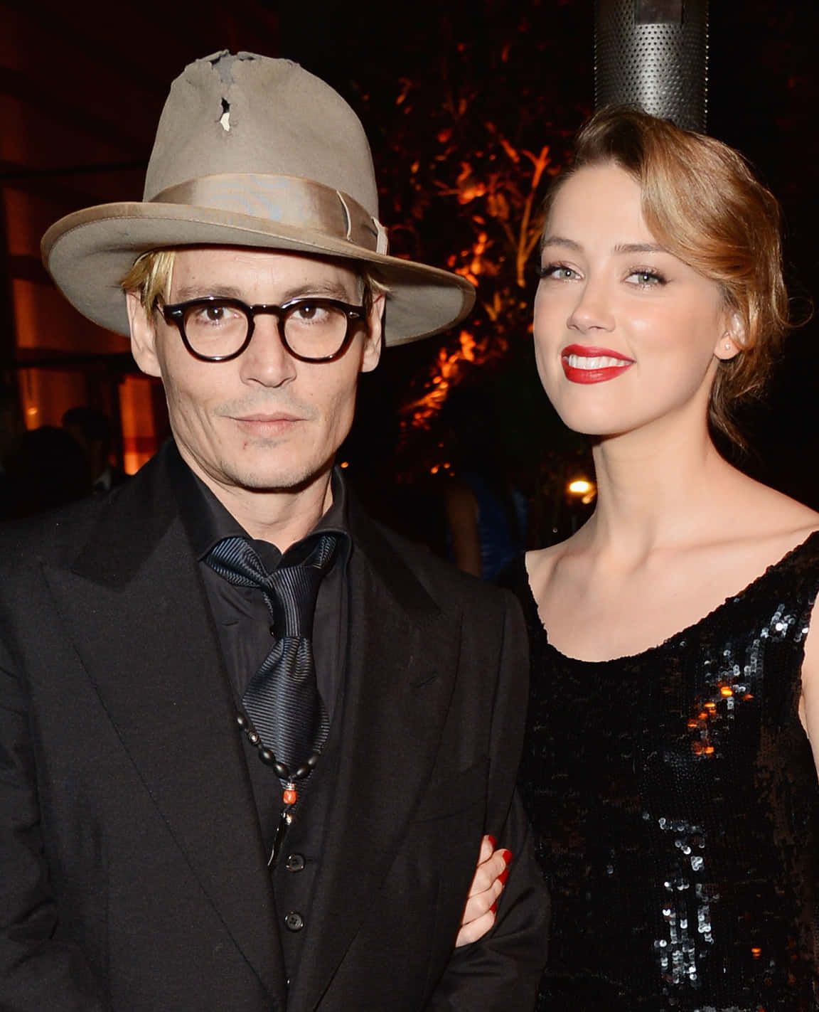 Johnny Depp and Amber Heard looking loving and stylish at the premier of The Rum Diary in 2011.