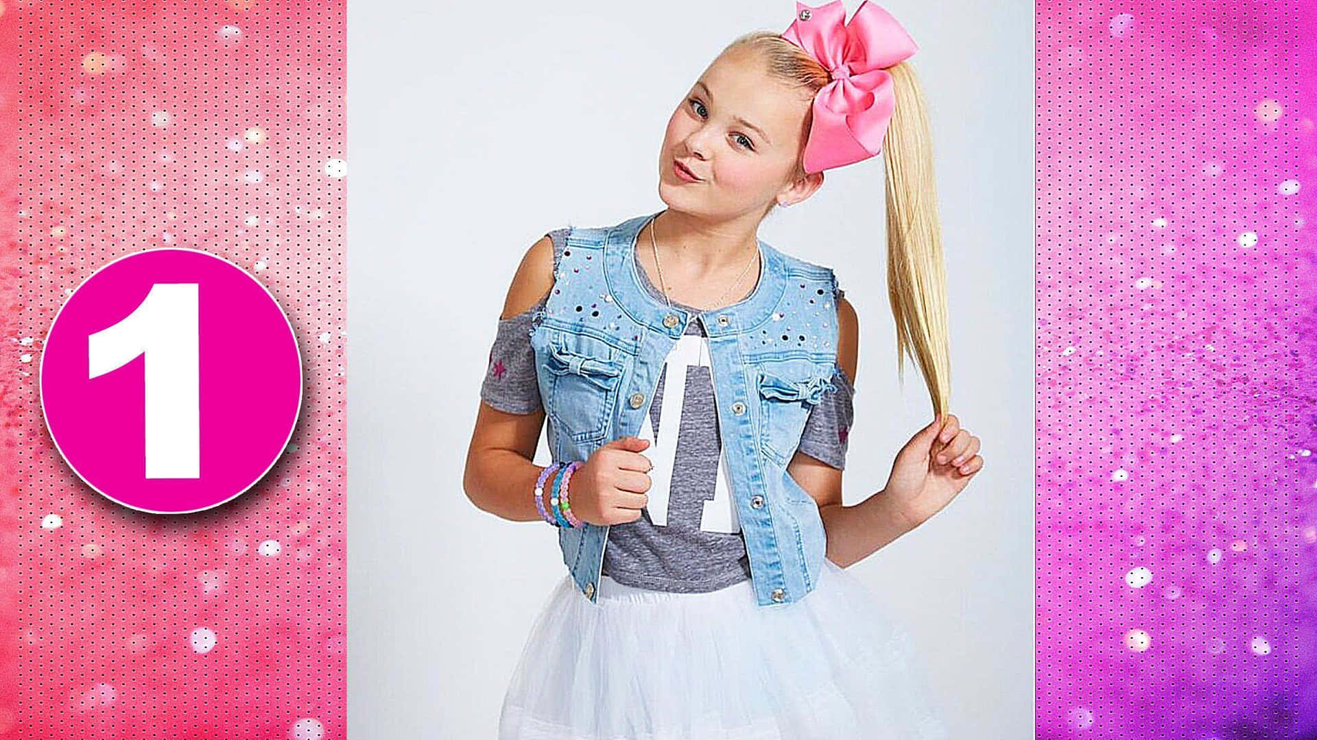 Jojo Siwa rocks the stage with her signature bows and energetic moves!