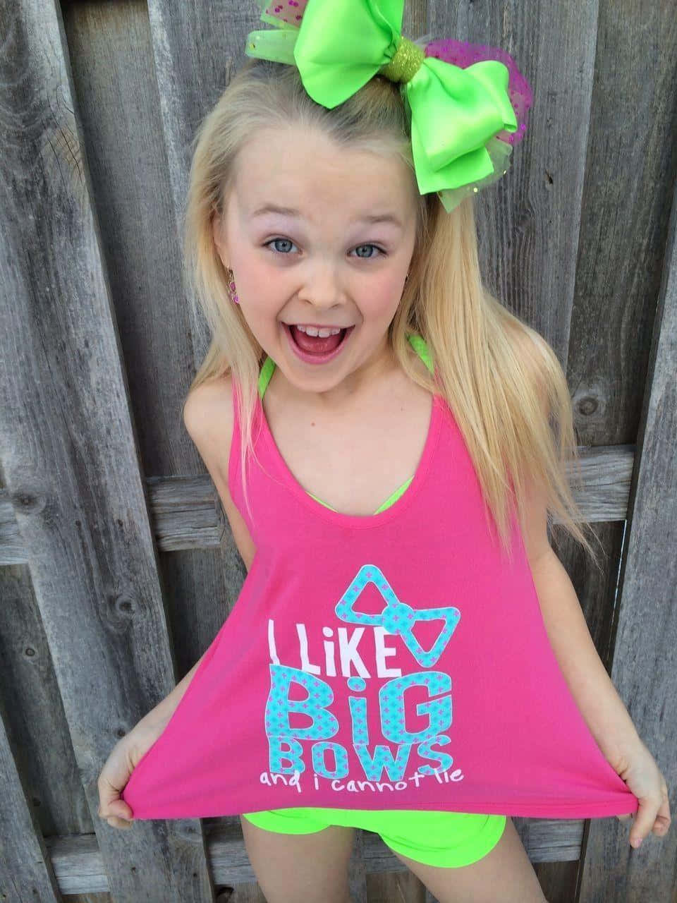 Jojo Siwa Captures the Spotlight With Bold T-shirt, Bow and Sparkles
