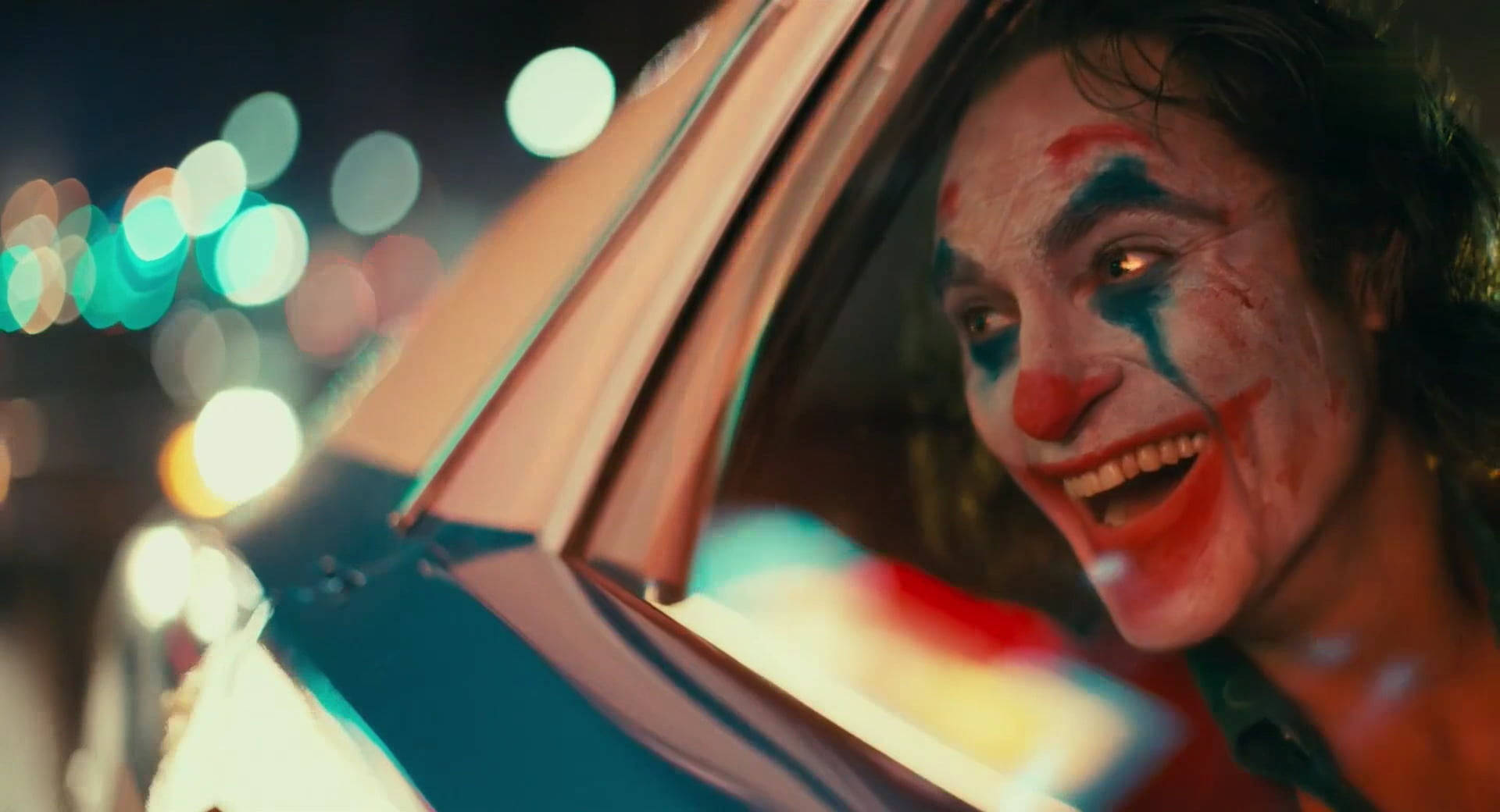 Joker 2020 From A Car's Window Wallpaper