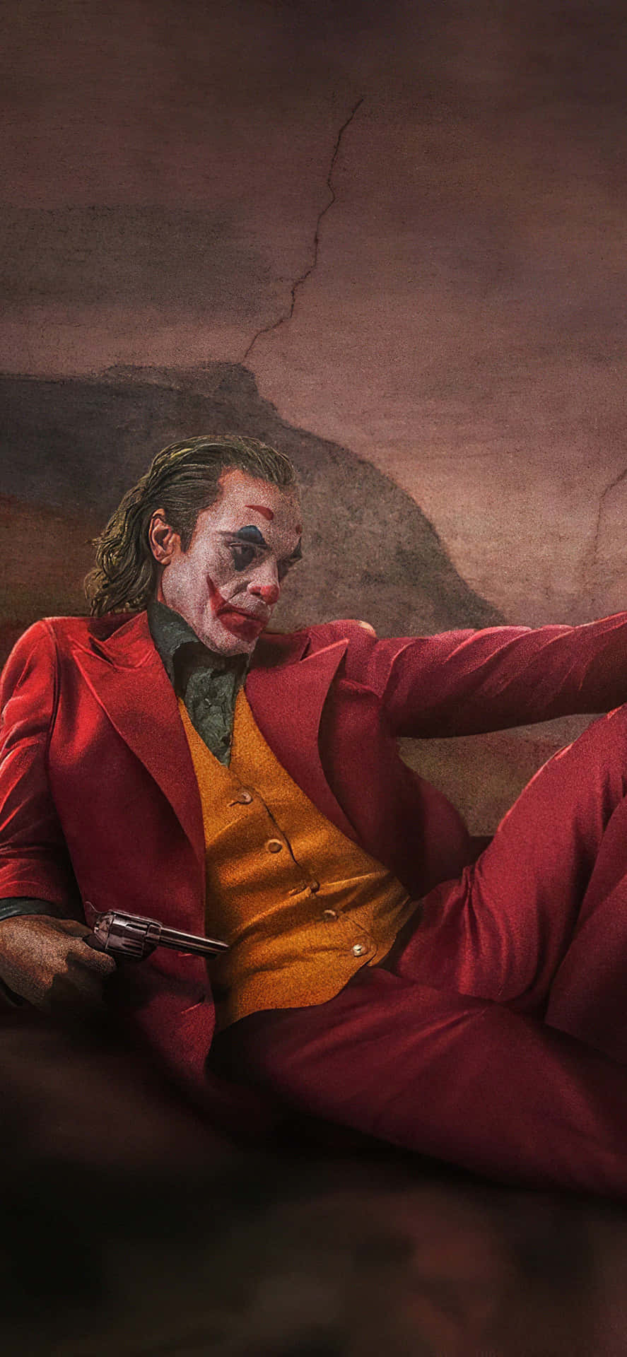 •  A mysterious and whimsical portrayal of the iconic Joker. Wallpaper
